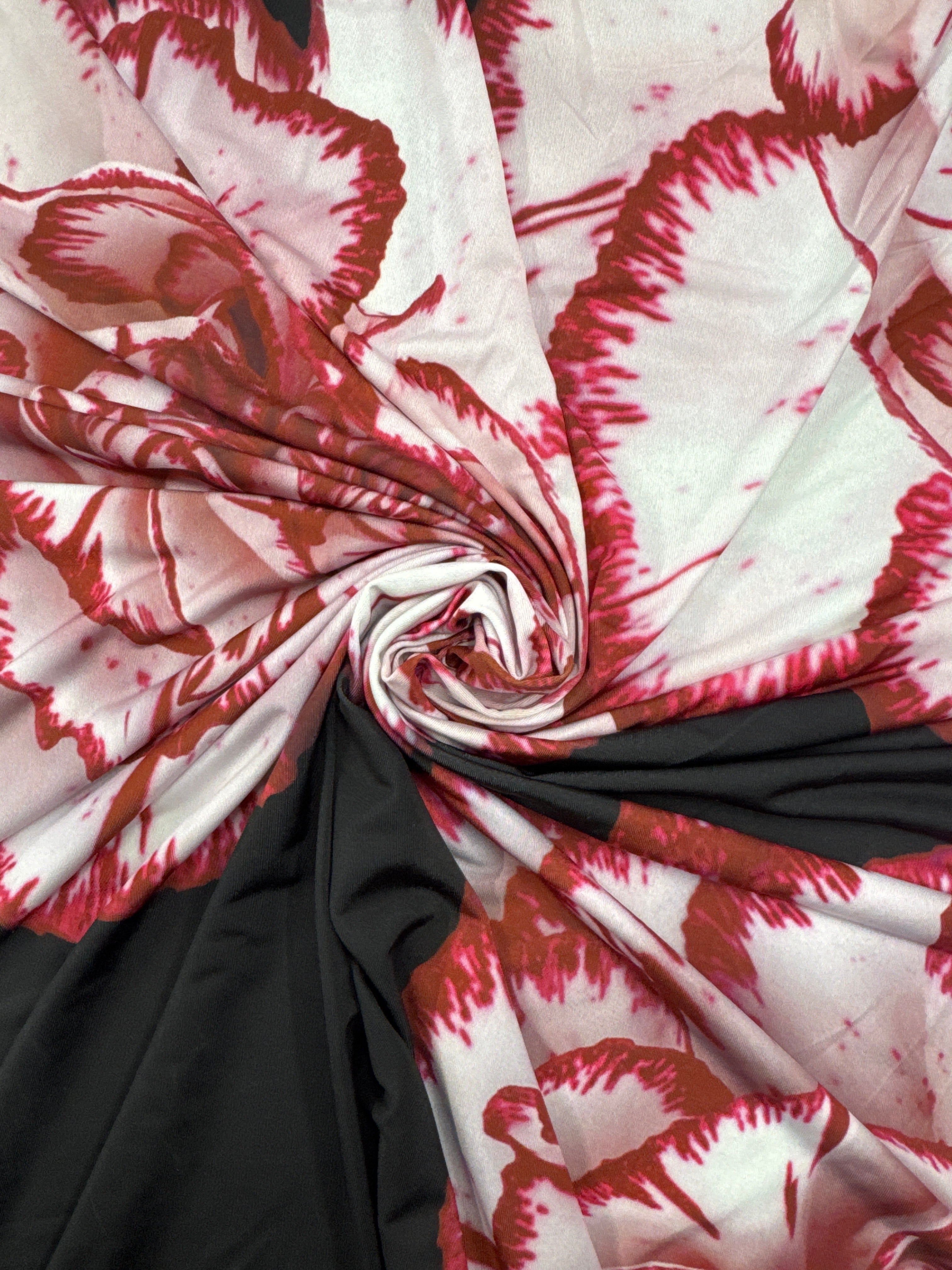 Black and red floral slinky jersey fabric with large rose print