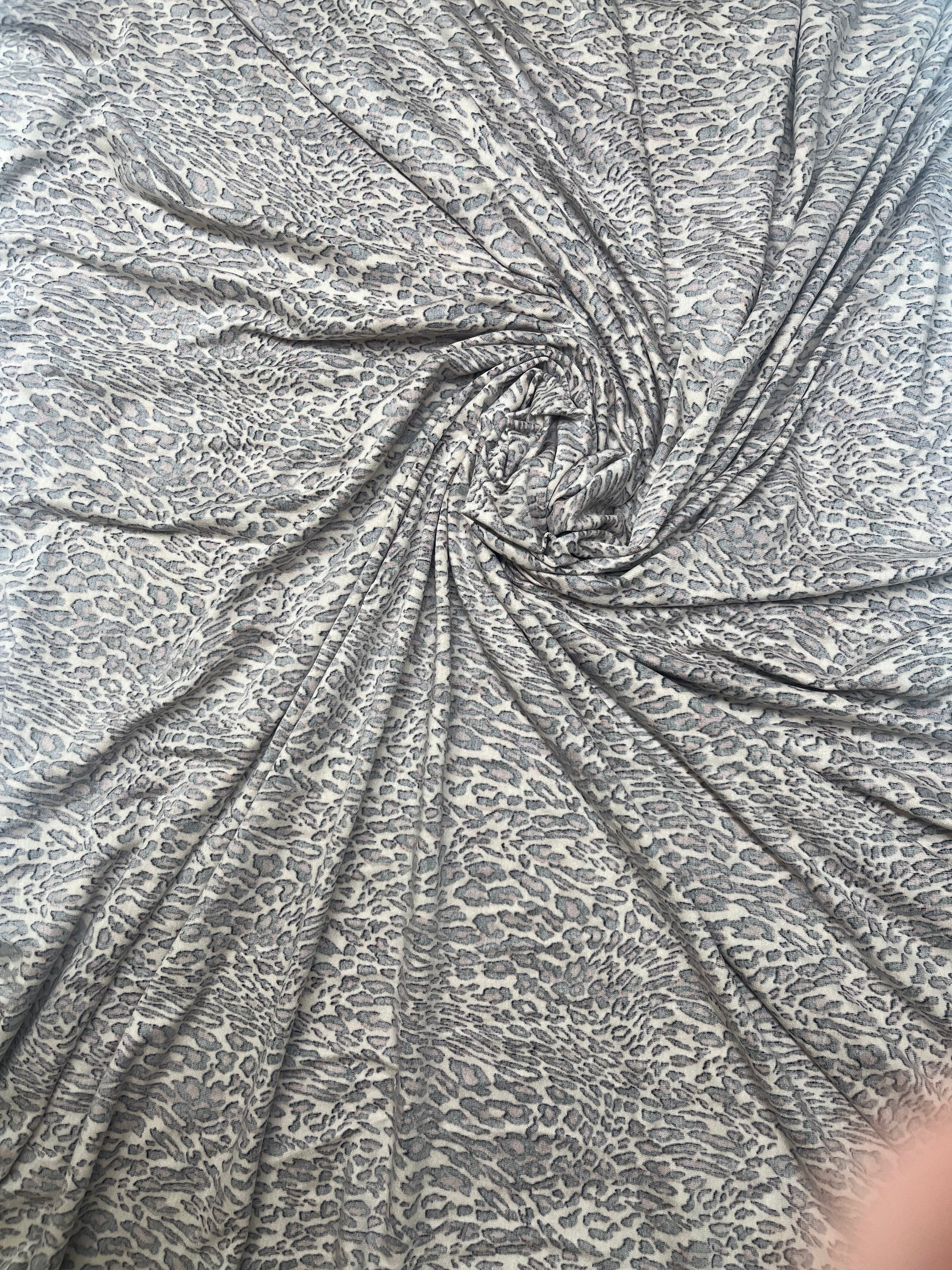 Animal Print Spun Polyester Jersey Fabric – Cream, Black & Rust 165cm