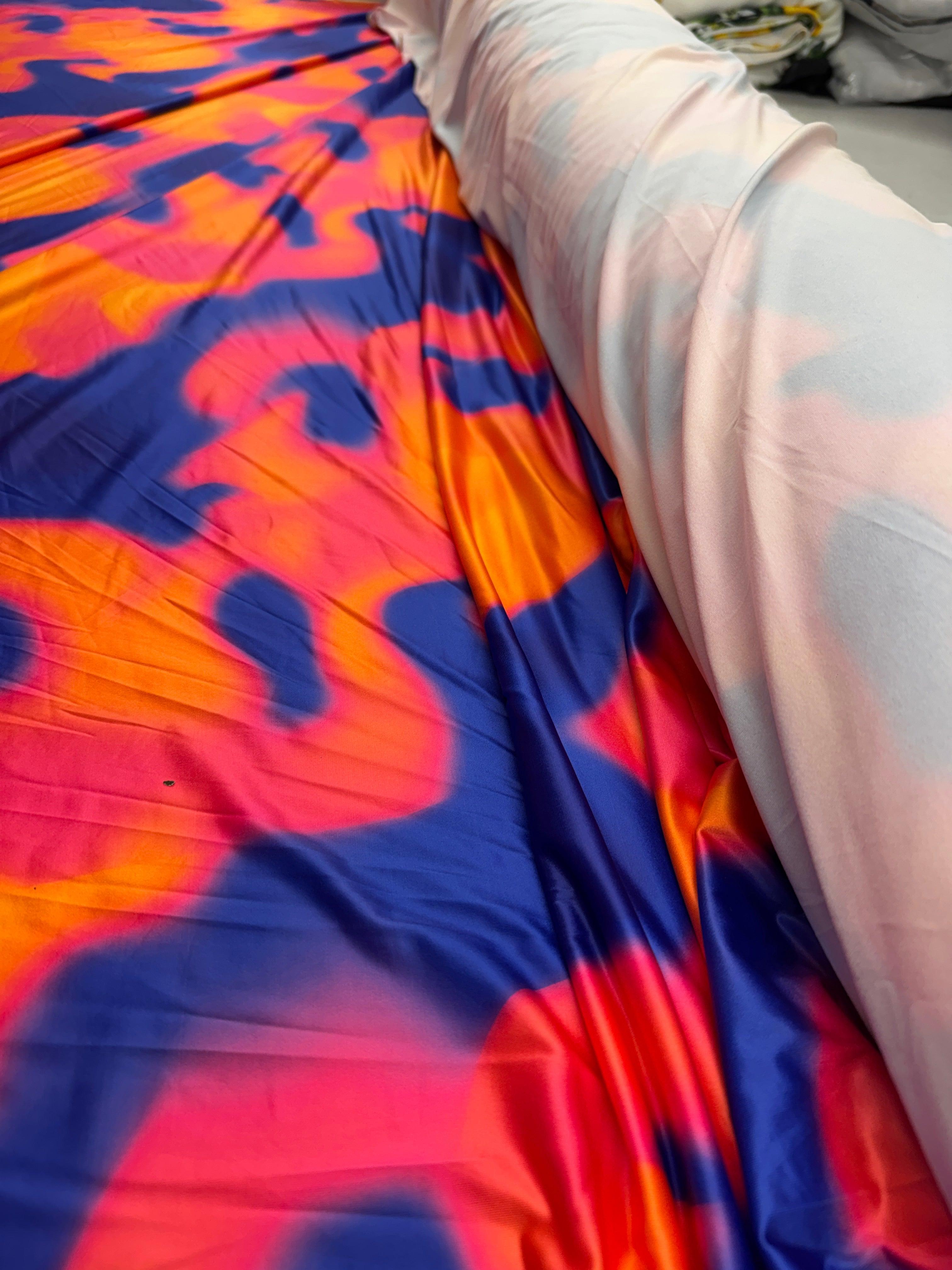 Abstract Neon Slinky Fabric – Vibrant Orange, Blue & Pink Fluid Stretch Textile