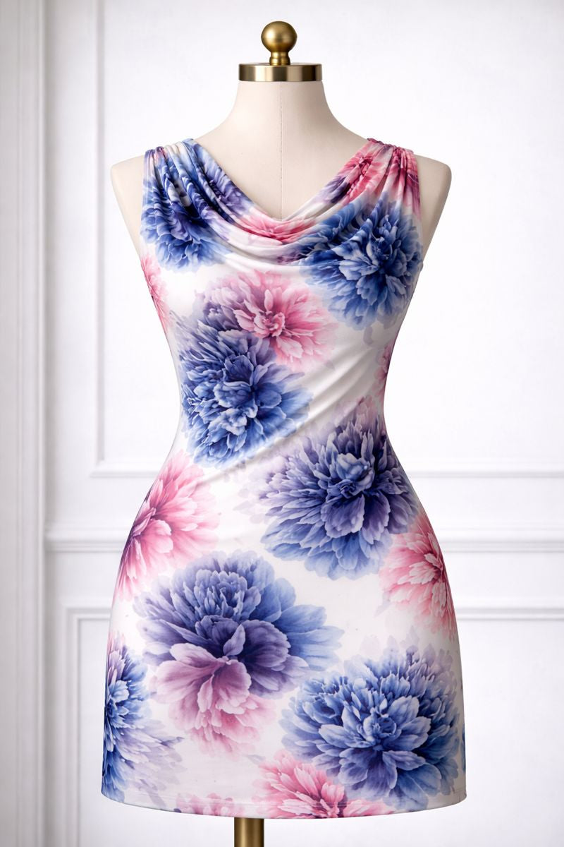Colorful floral dress on a mannequin against a white background