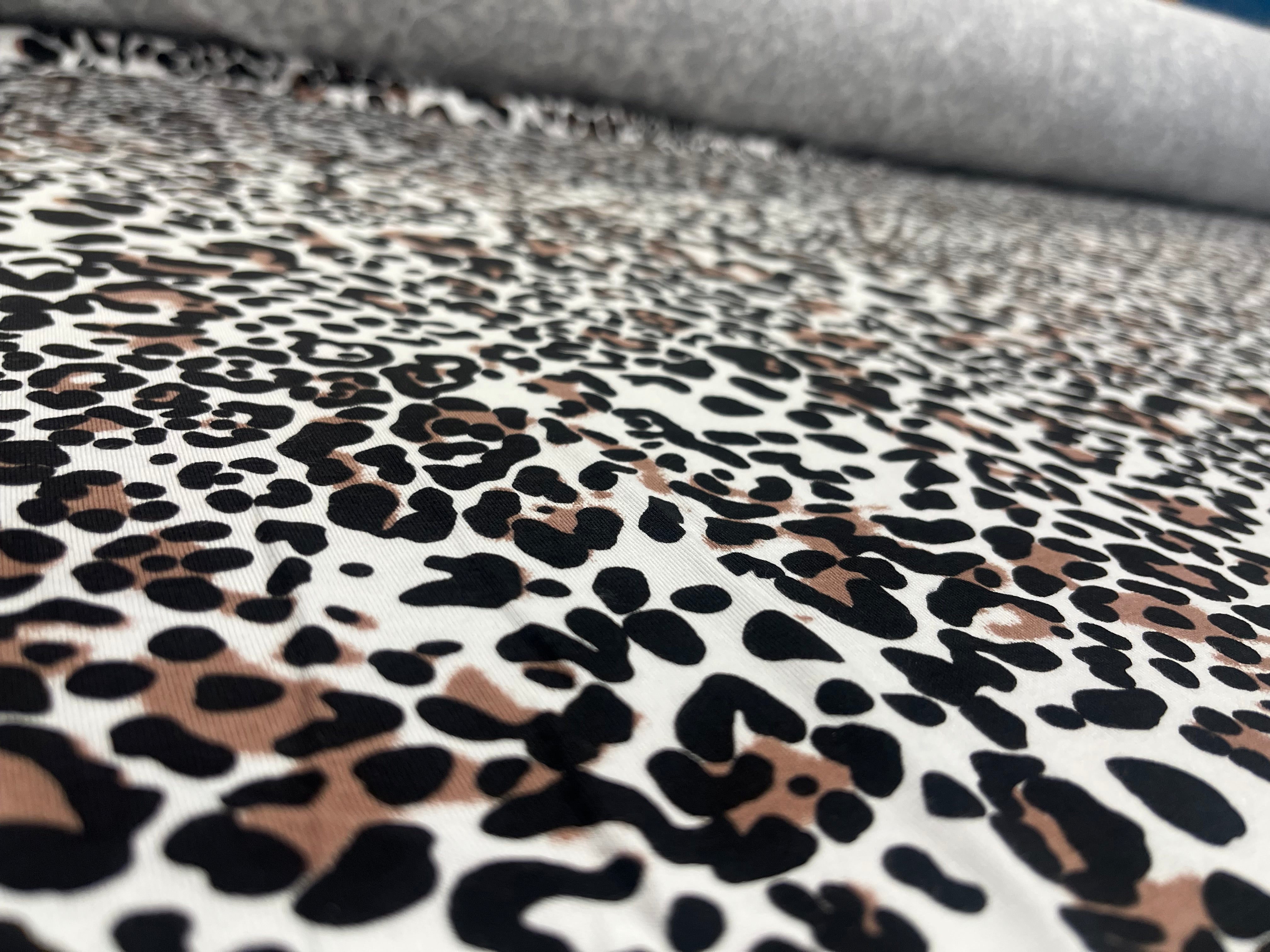 Snow Leopard Animal Print Viscose Fabric 145cm wide
