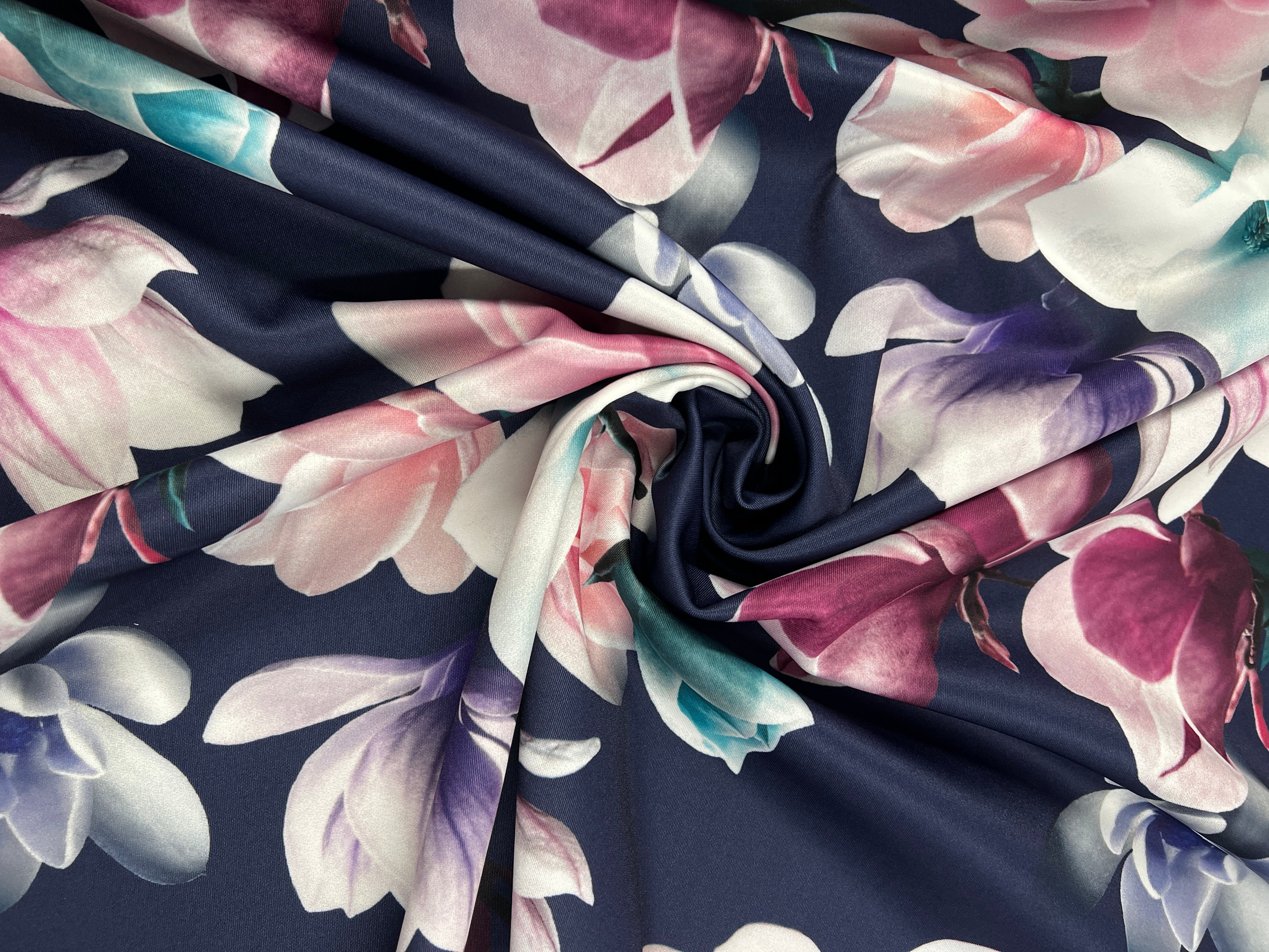 Navy & Blush Magnolia Blossom Floral Scuba Fabric – pink, ivory, lilac and plum magnolias on a deep navy ground