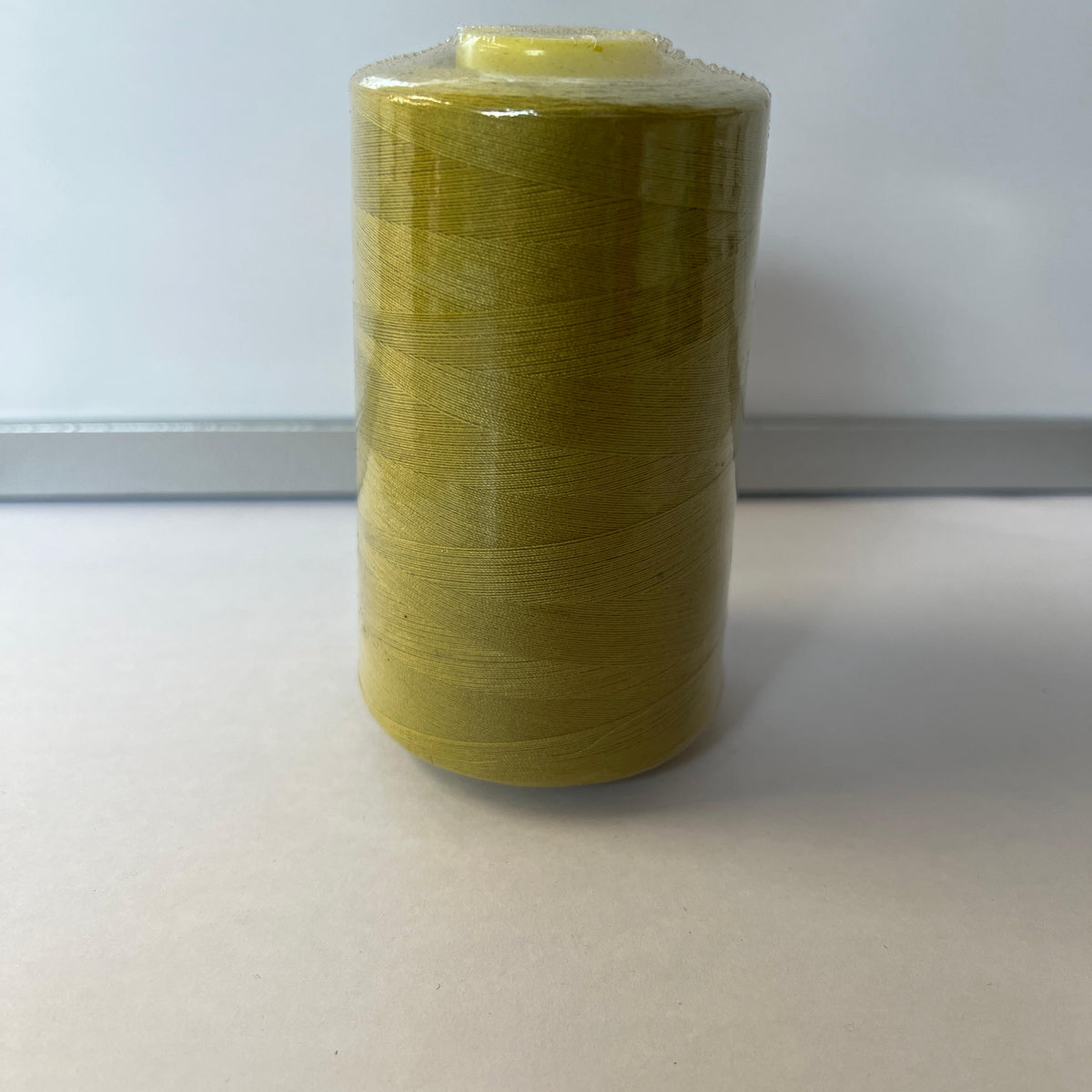 Dew Yellow Spun Polyester Thread Cone - 5000 Yds – Fabric By The Yard