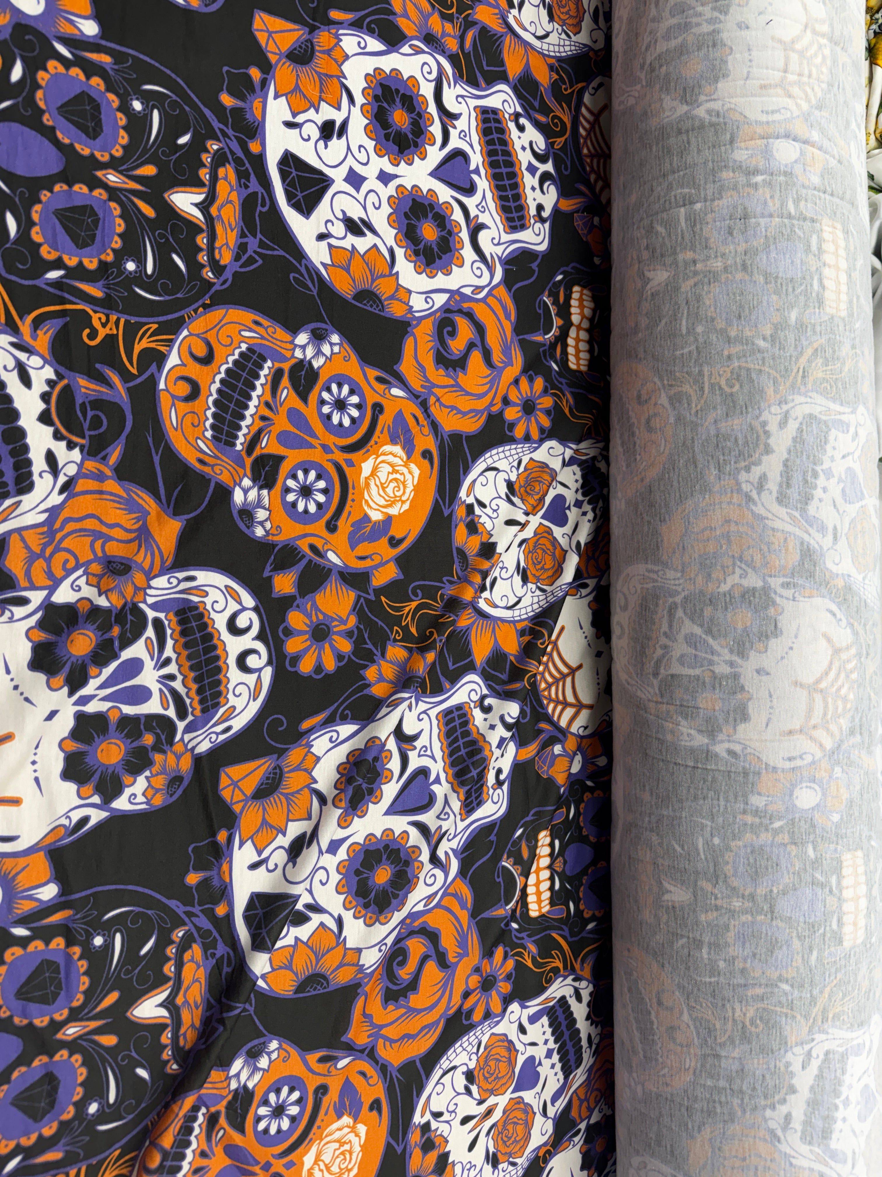 Soft polyester fabric with vibrant sugar skull patterns