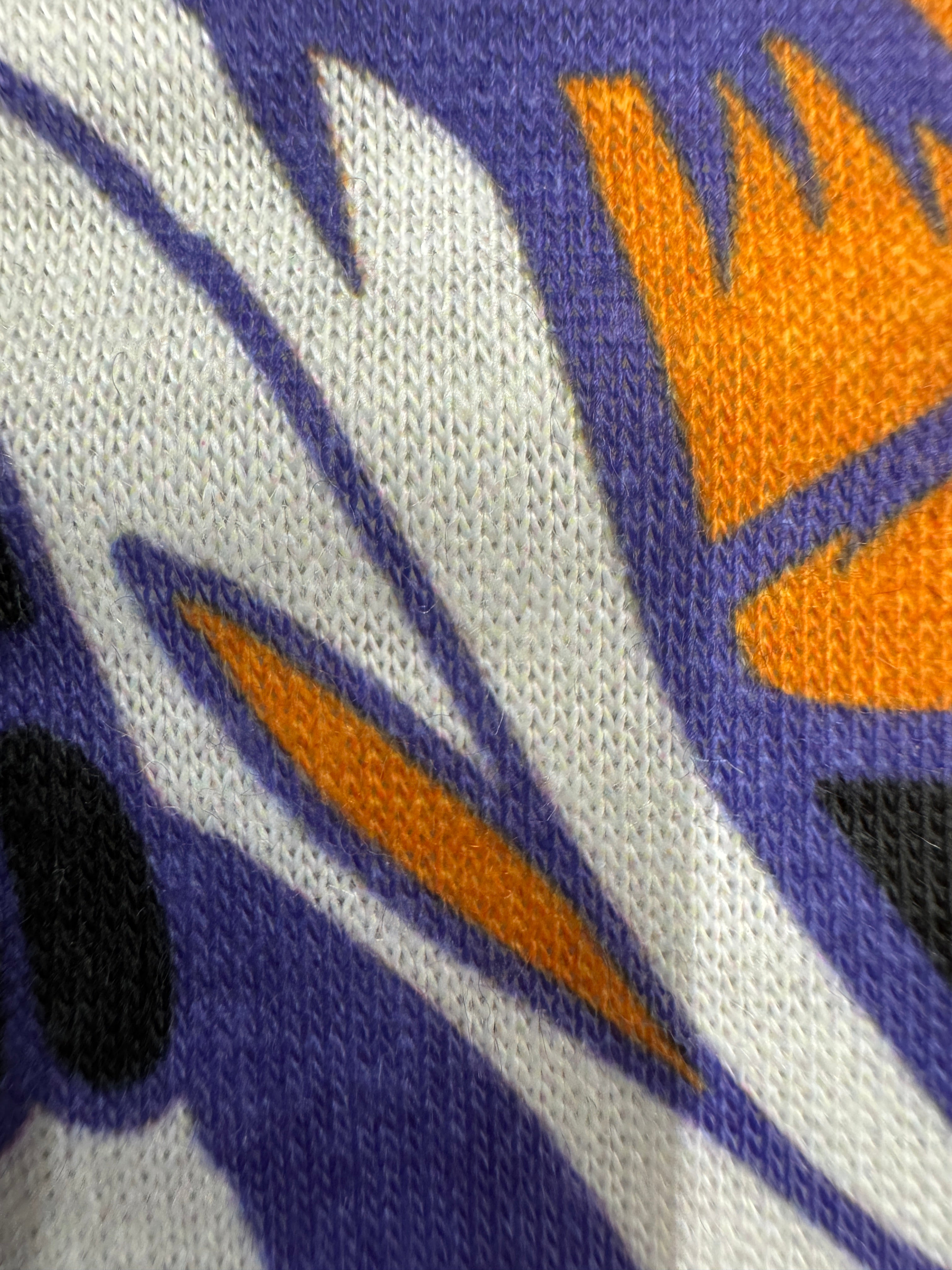 Stretchy jersey fabric featuring Day of the Dead skull motifs