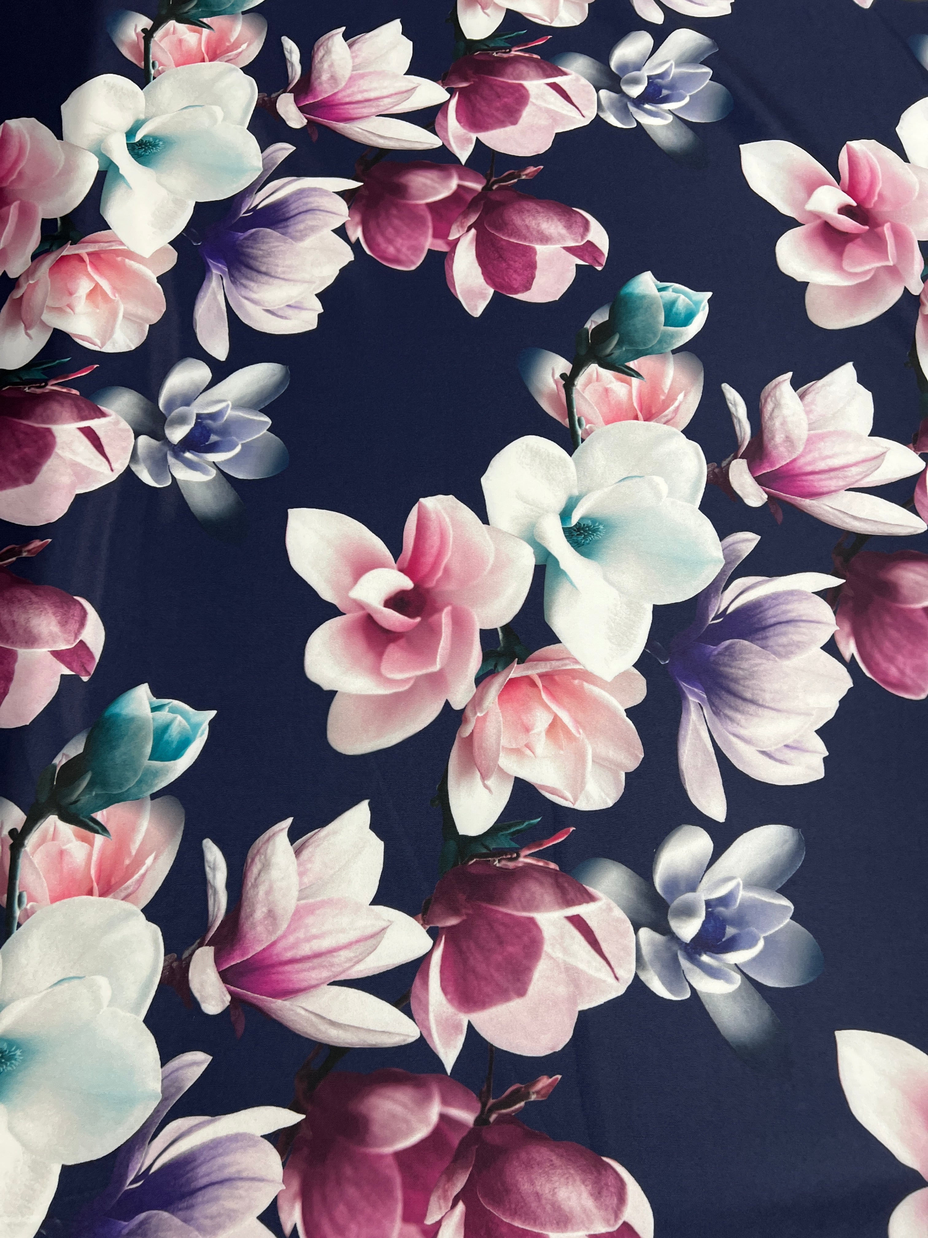 Navy & Blush Magnolia Blossom Floral Scuba Fabric – pink, ivory, lilac and plum magnolias on a deep navy ground