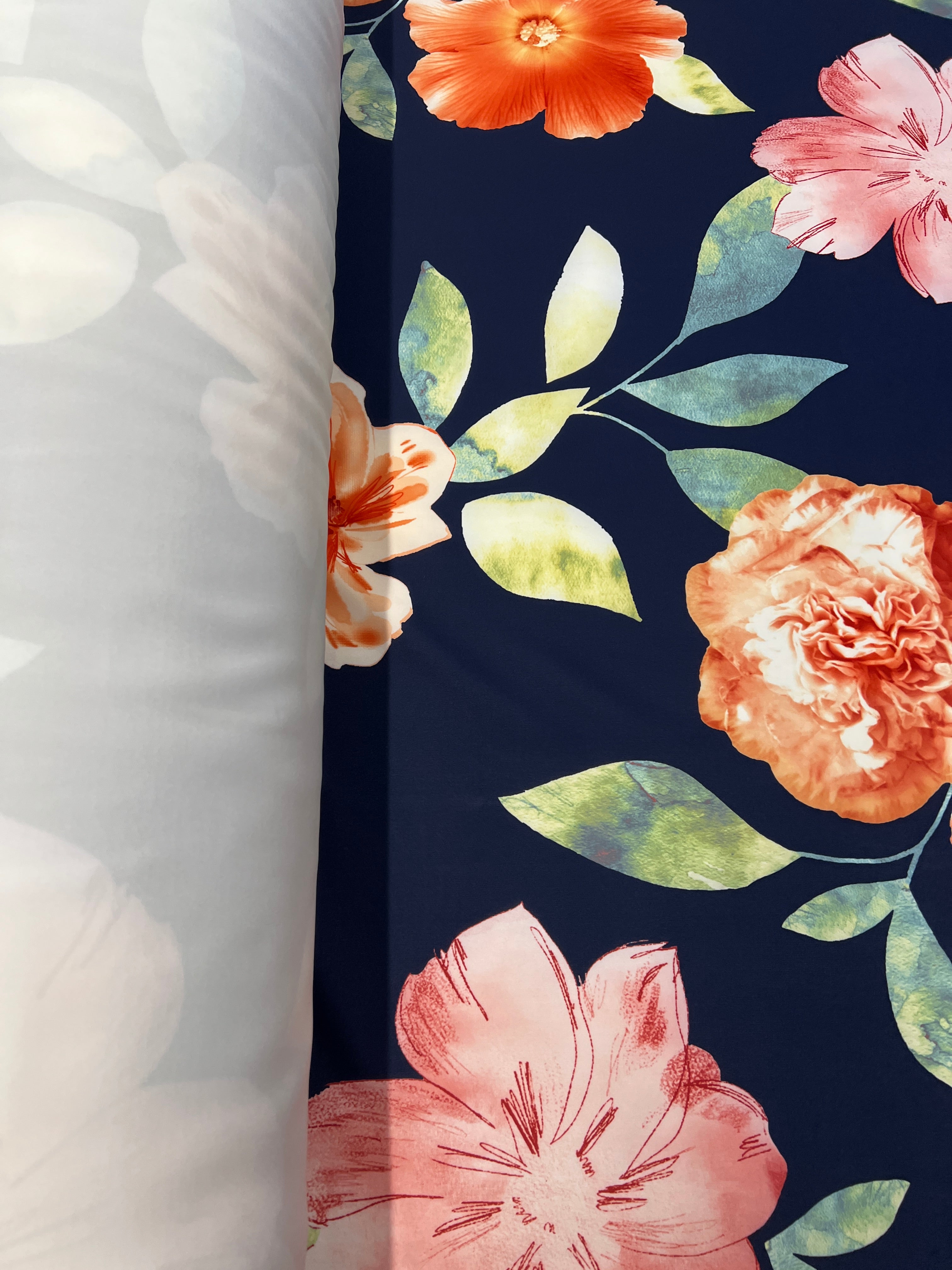 Navy & Coral Watercolour Hibiscus Floral Scuba Fabric – coral hibiscus, peach carnations and pink blossoms on a navy ground