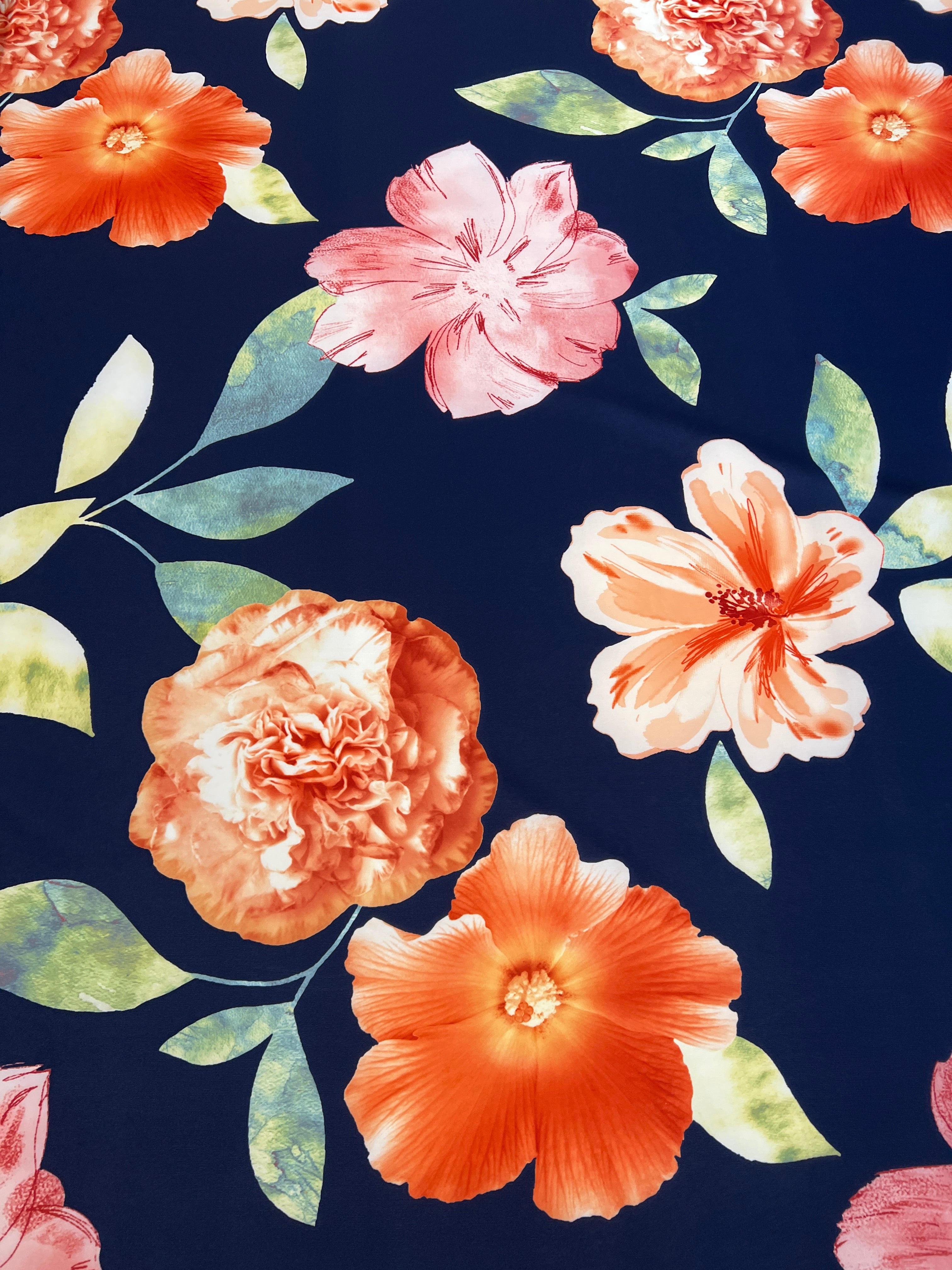 Navy & Coral Watercolour Hibiscus Floral Scuba Fabric – coral hibiscus, peach carnations and pink blossoms on a navy ground