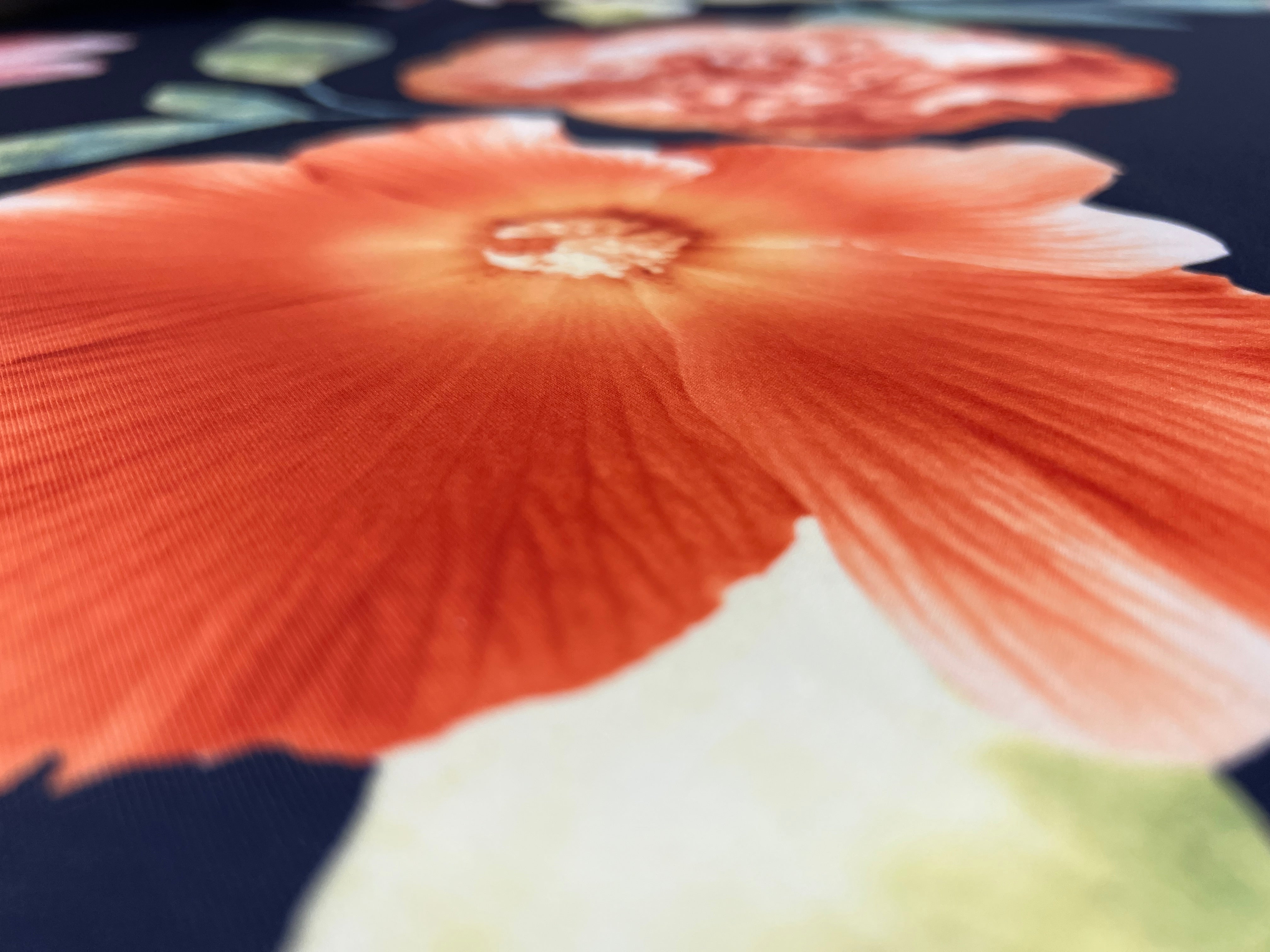 Navy & Coral Watercolour Hibiscus Floral Scuba Fabric – coral hibiscus, peach carnations and pink blossoms on a navy ground