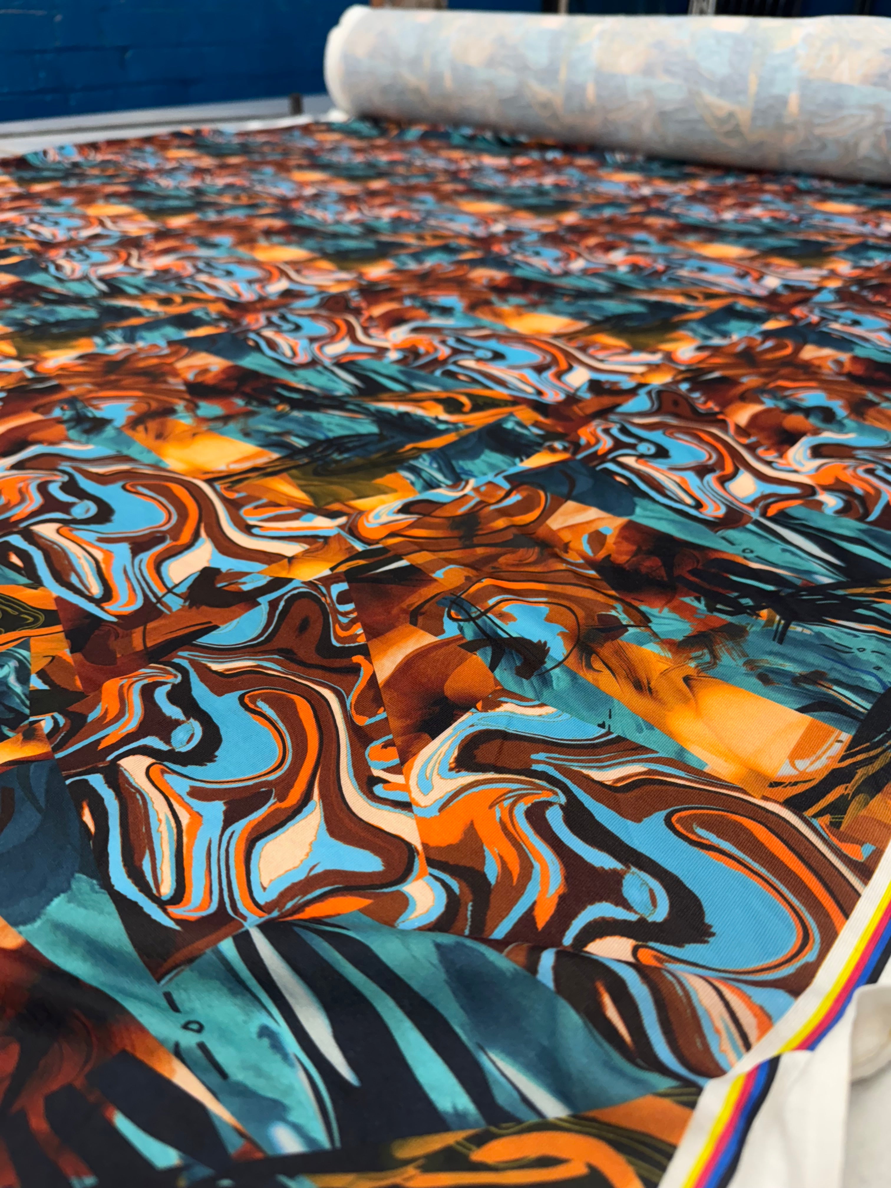 Abstract Marble Print Spun Polyester Jersey Fabric – Teal, Amber & Rust 150cm