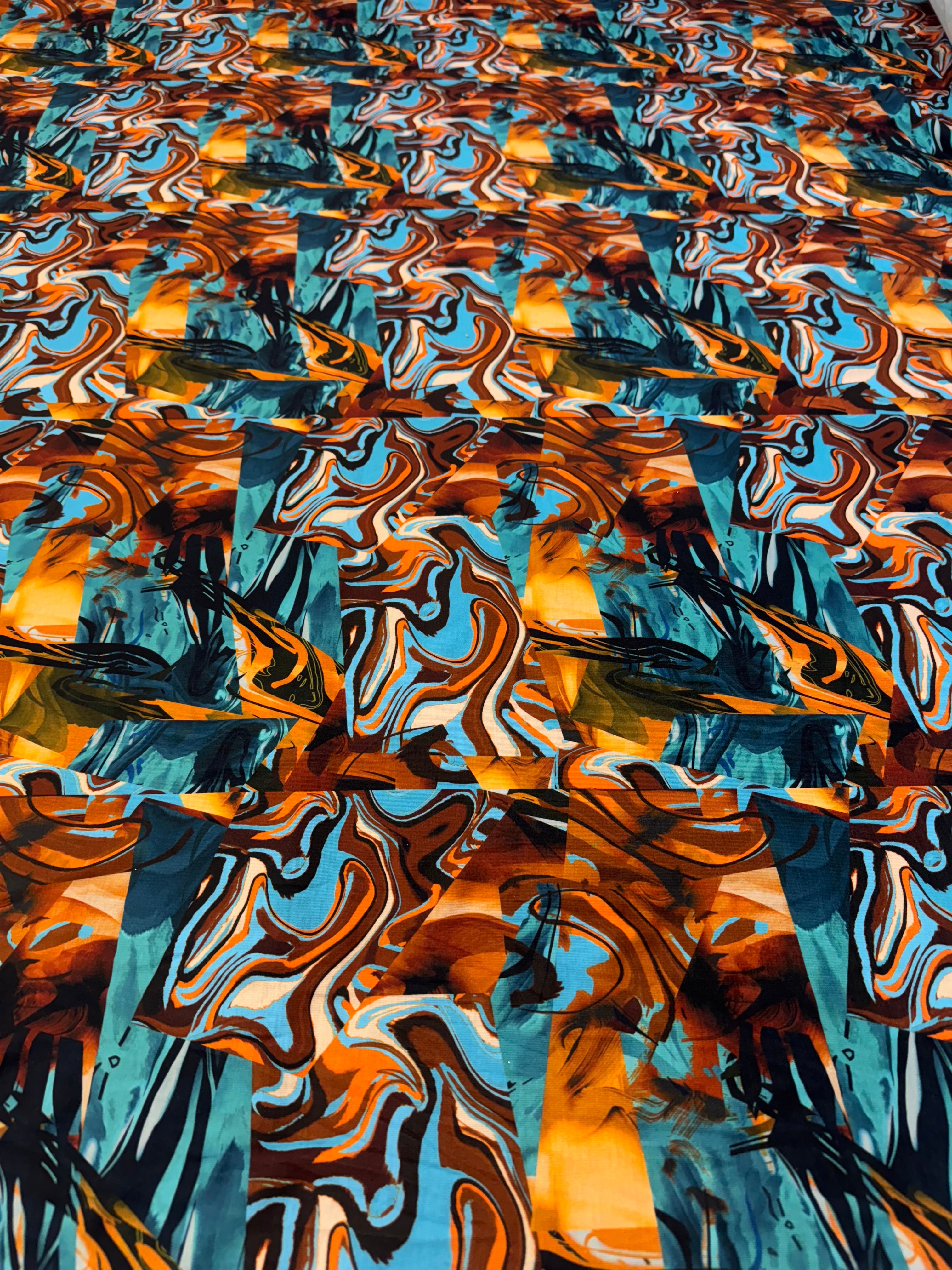 Abstract Marble Print Spun Polyester Jersey Fabric – Teal, Amber & Rust 150cm