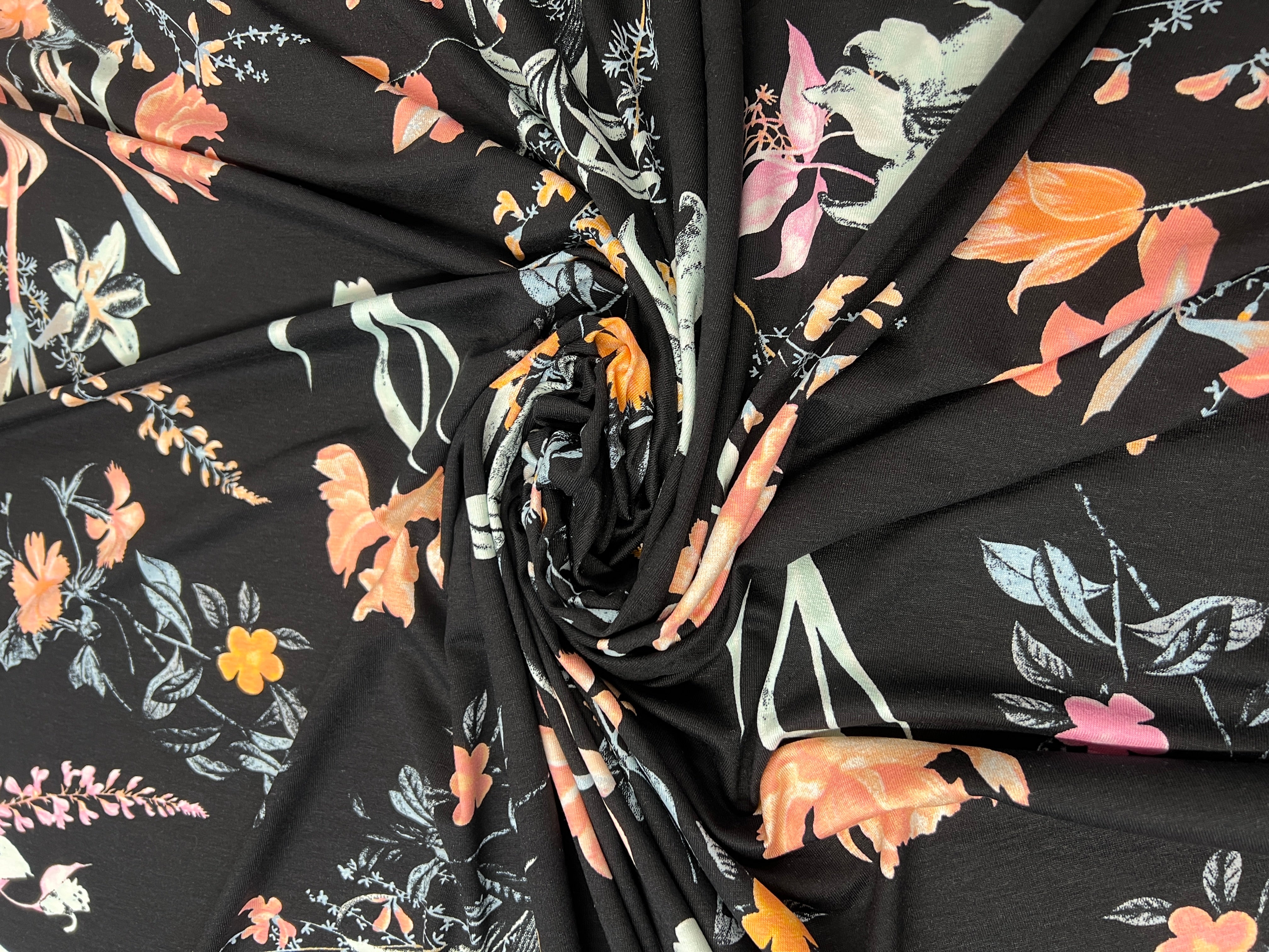 Dressmaking & Jersey Fabric – Black Floral Stretch Knit with Peach & Pink Blossoms – 173cm