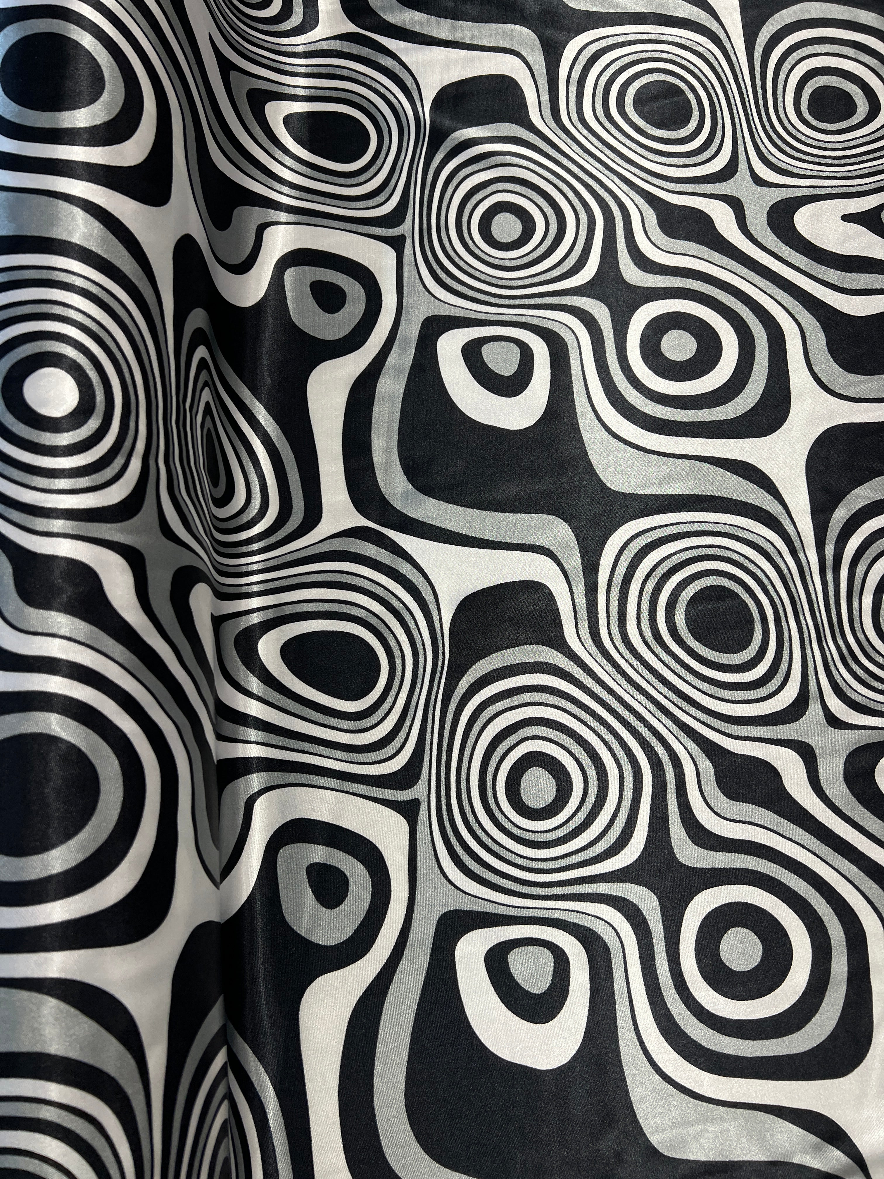 Dressmaking & Statement Fabric – Monochrome Op Art Swirl Satin Fabric – Black & White Psychedelic Print – 145cm
