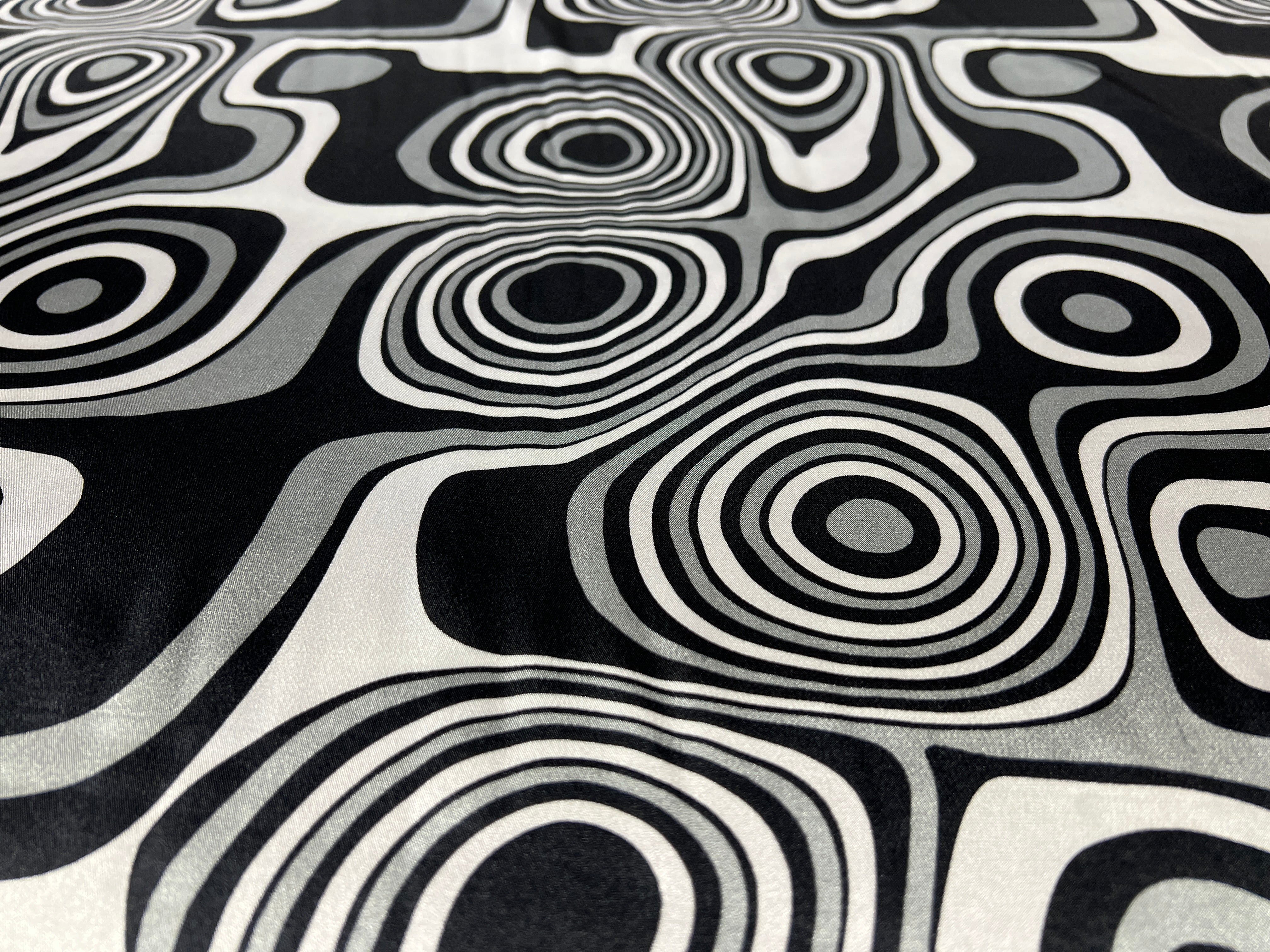 Dressmaking & Statement Fabric – Monochrome Op Art Swirl Satin Fabric – Black & White Psychedelic Print – 145cm