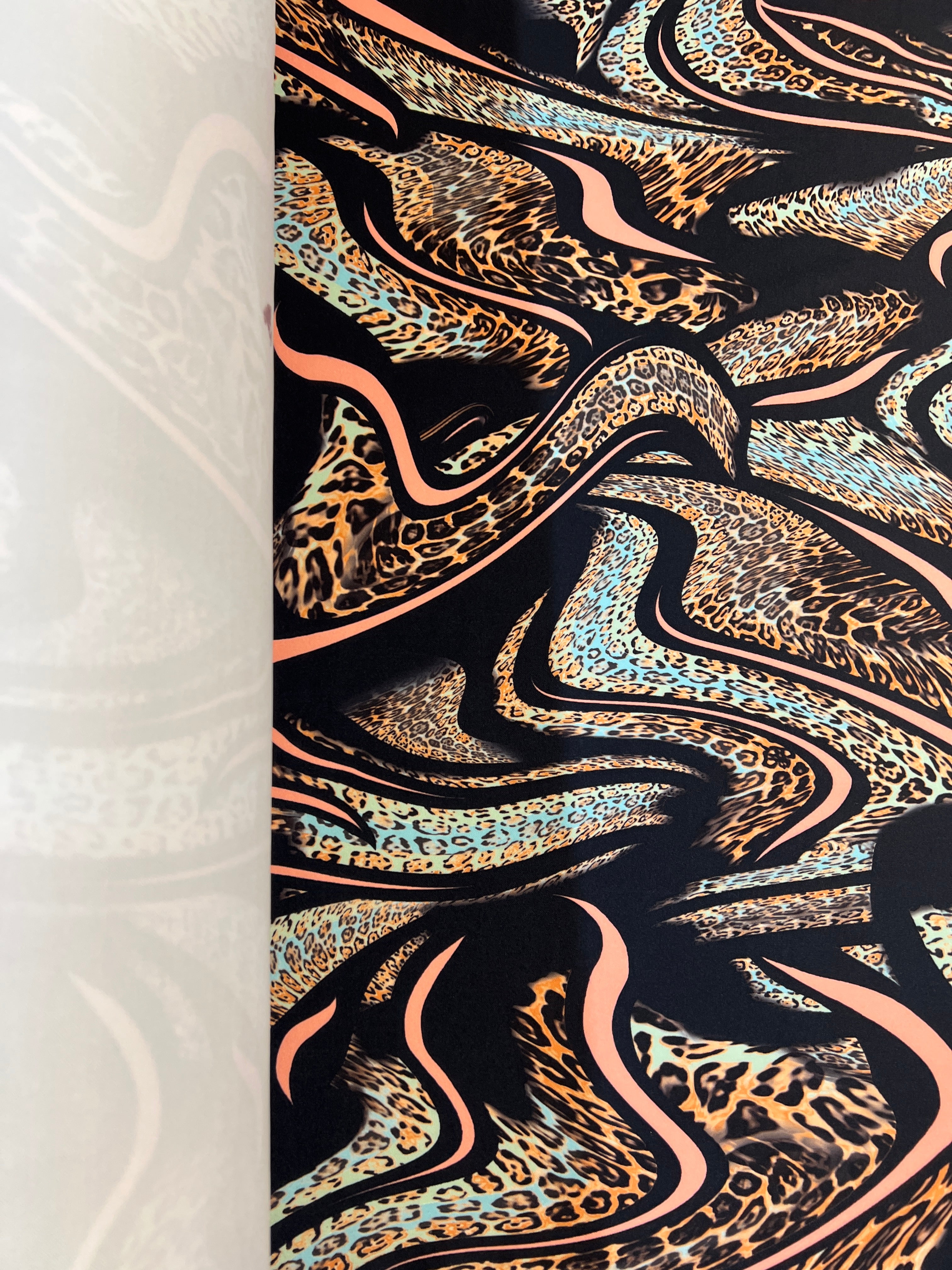 Dressmaking & Bodycon Fabric – Fluid Animal Swirl Scuba Fabric with Leopard Print Stretch – 140cm