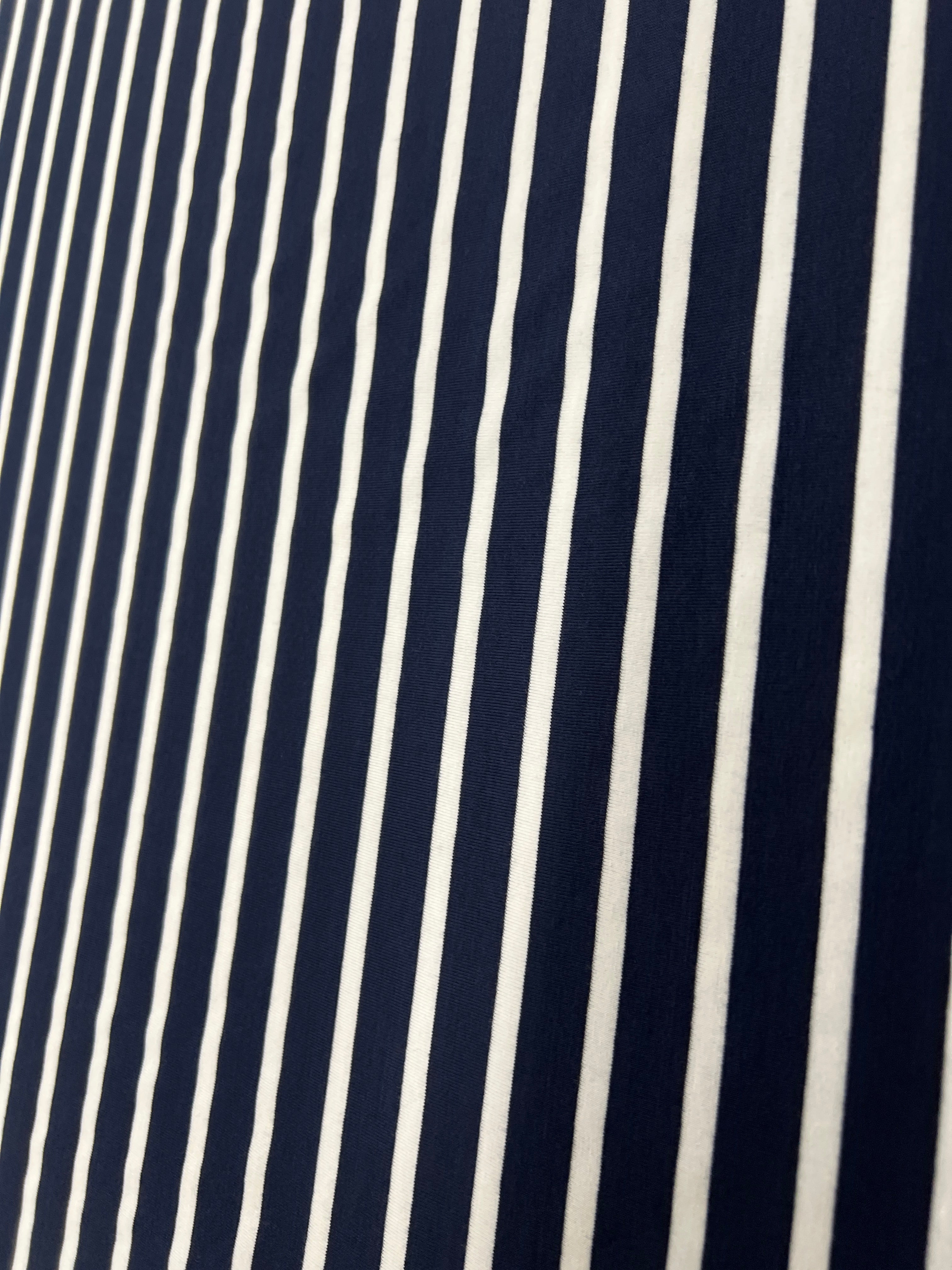 Navy blue fabric with white stripes