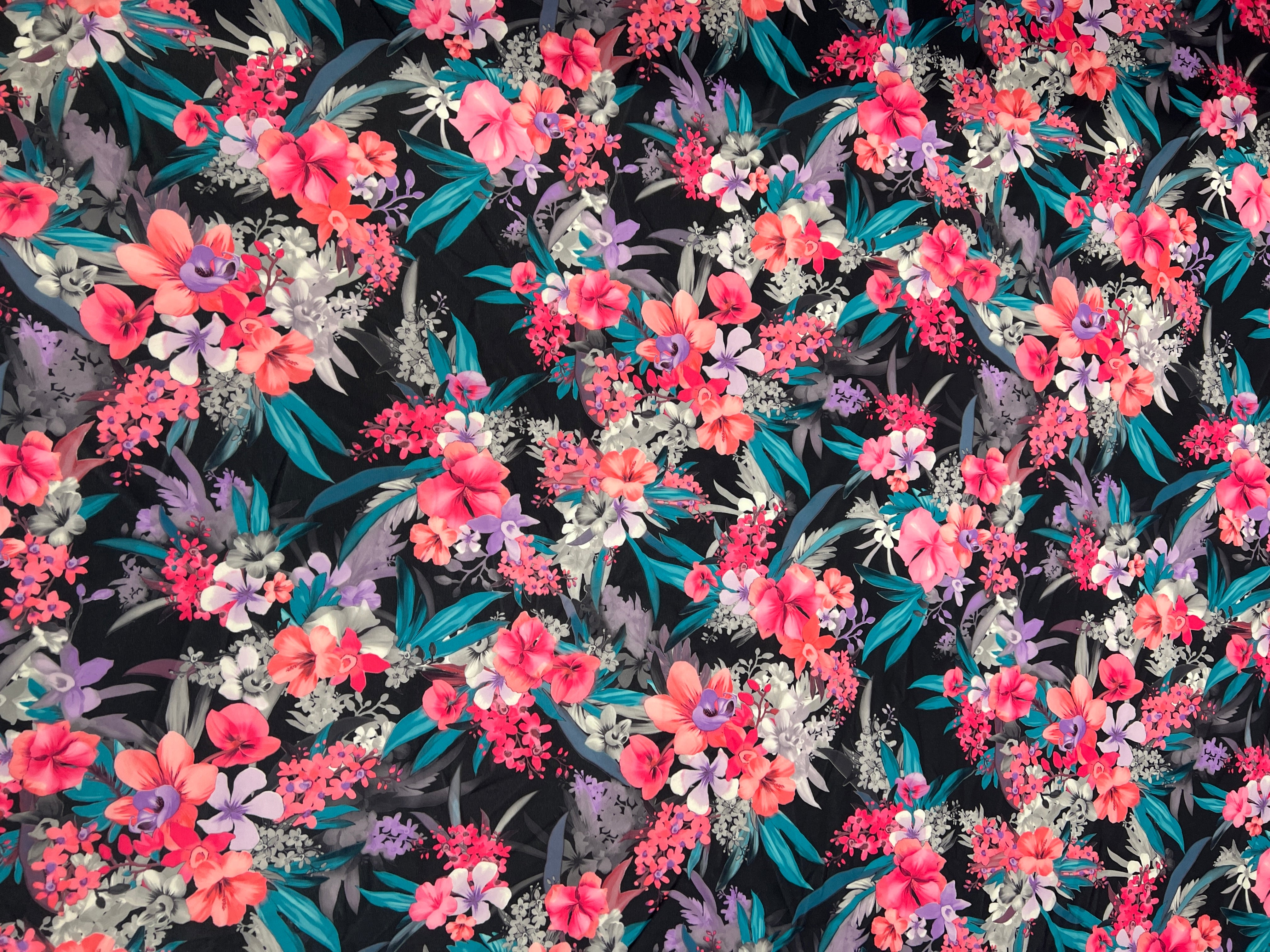 Colorful floral pattern on a dark background