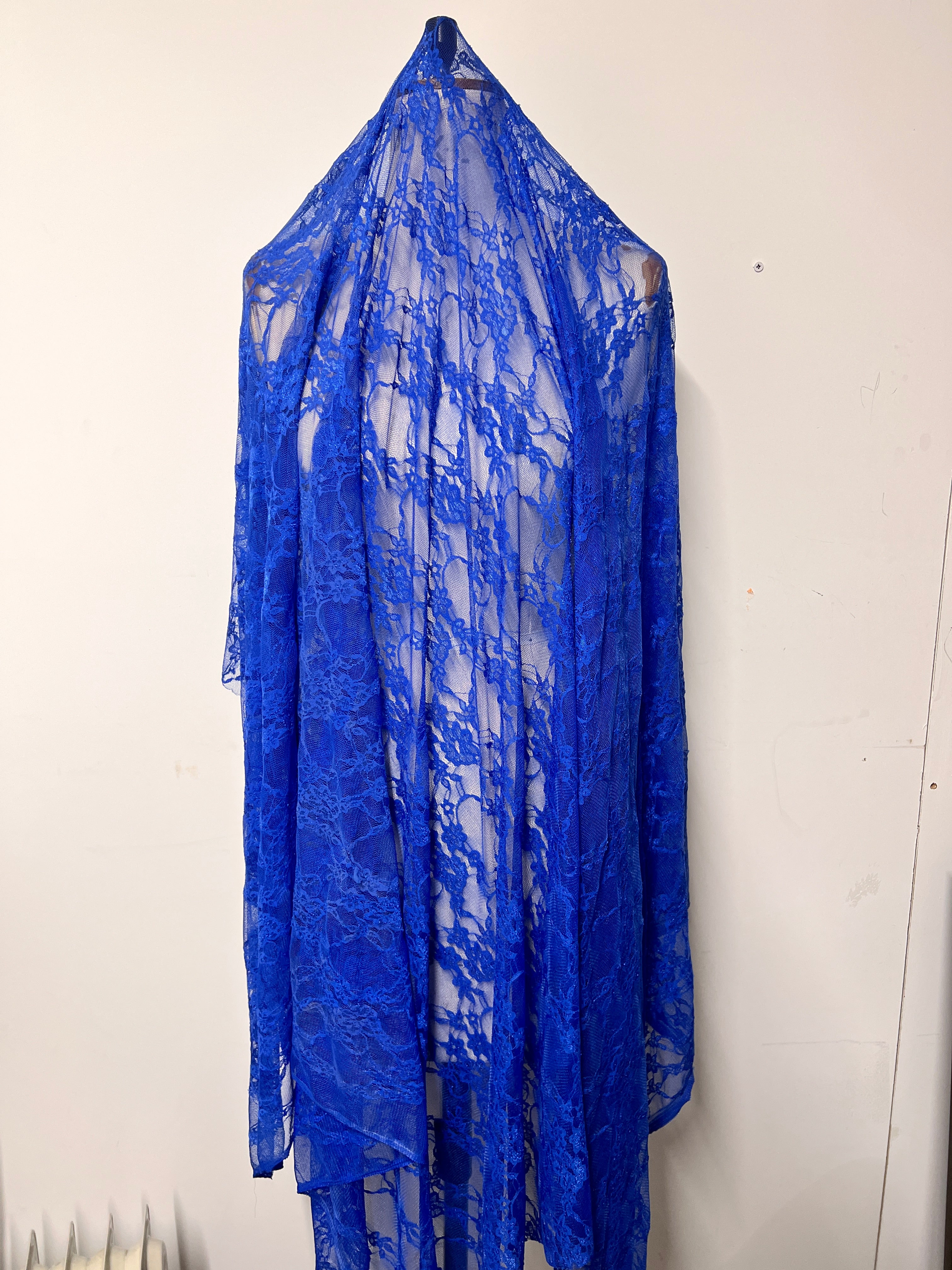 Blue plastic sheet on a white surface