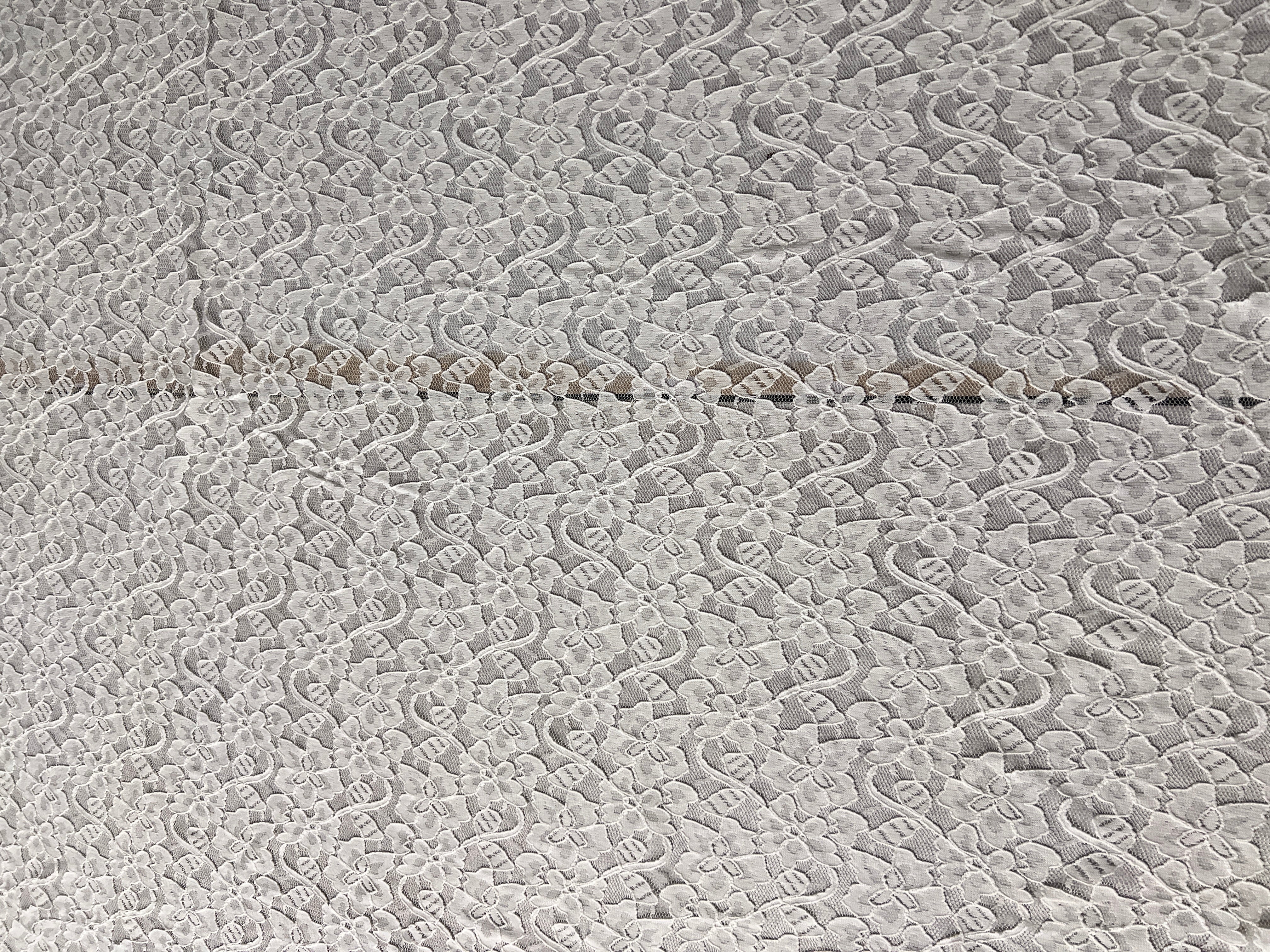 Close-up of textured gray surface with intricate patterns