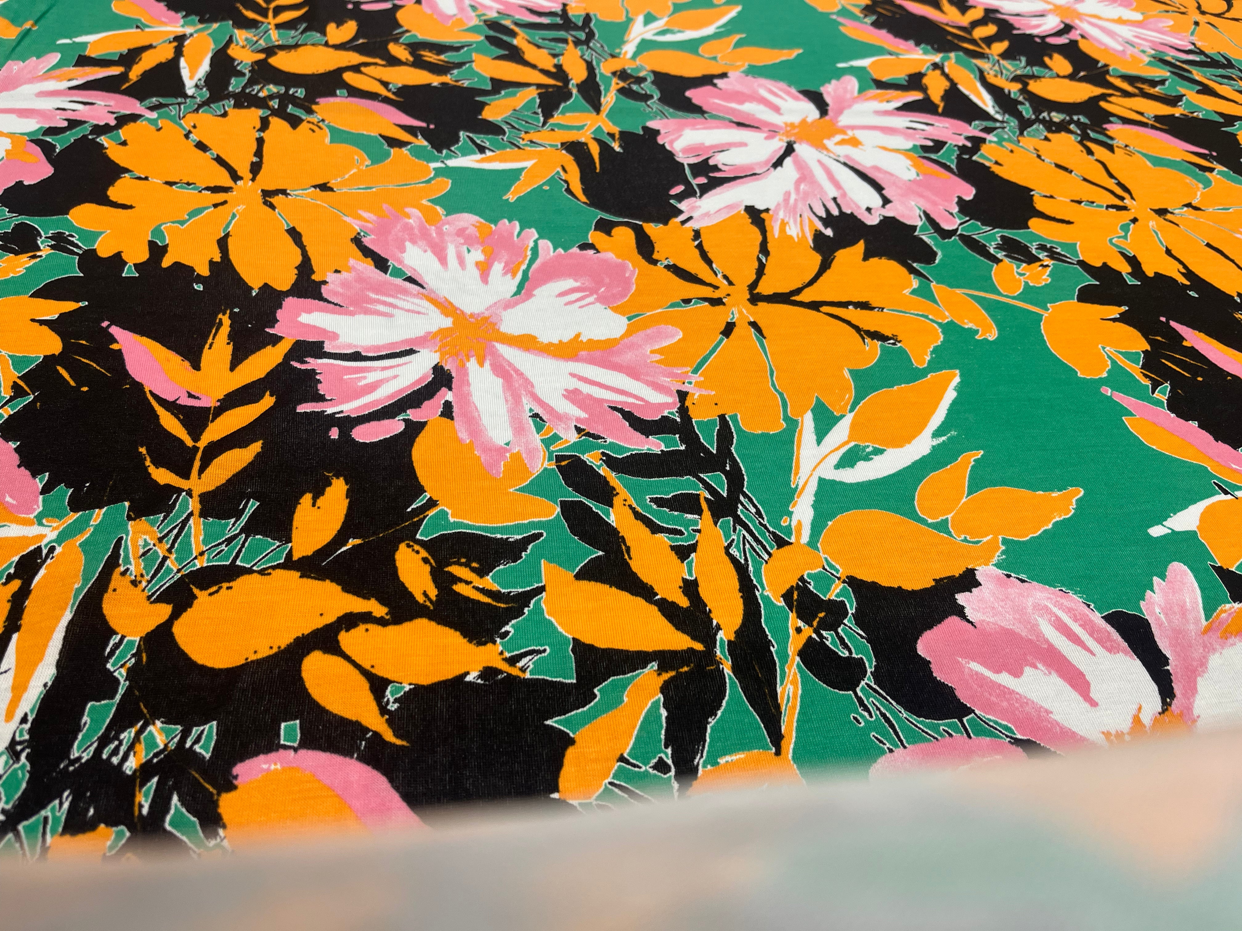 Green Floral Spun Polyester Jersey Fabric with Pink & Mustard Flowers 145cm