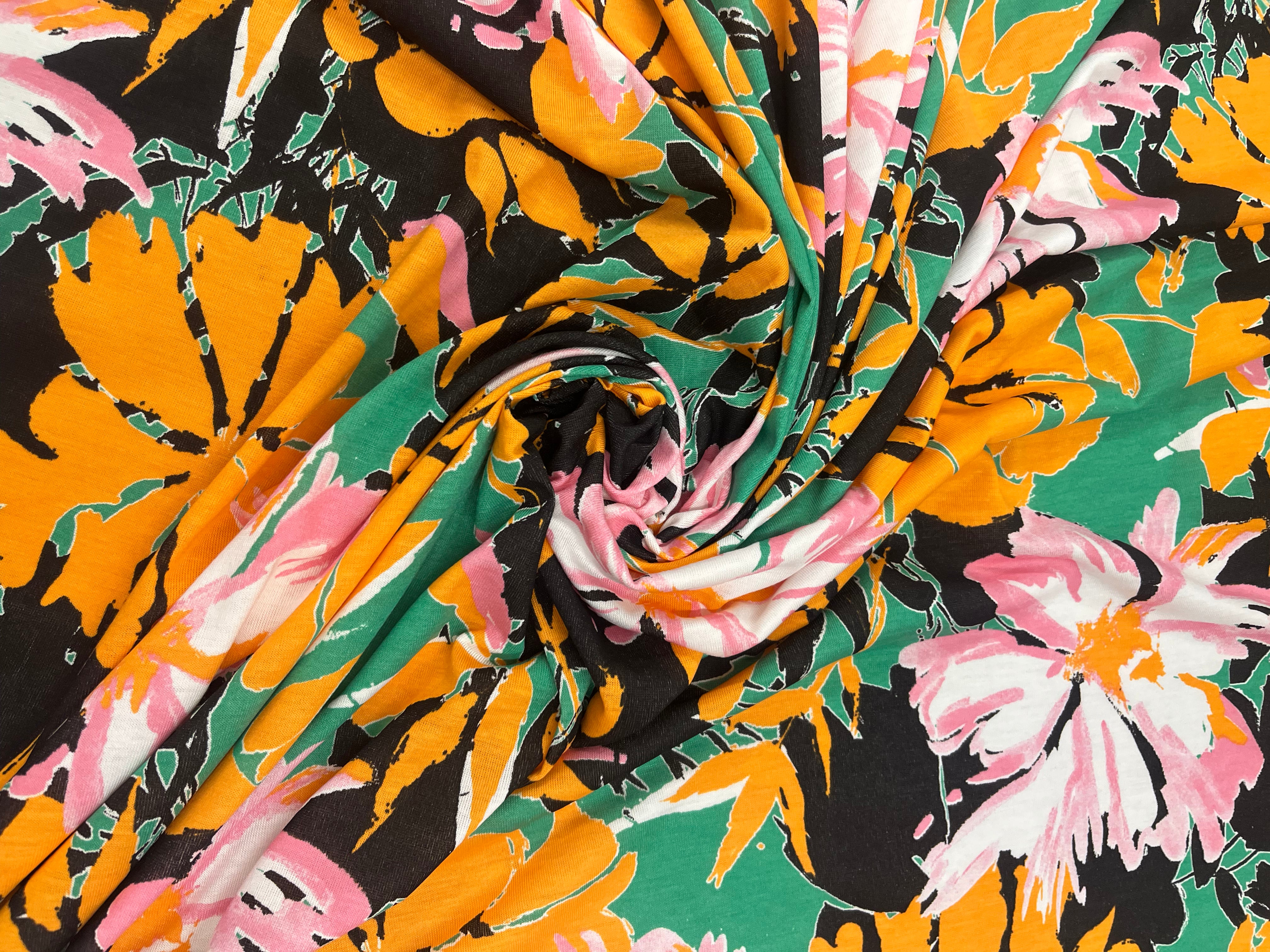 Green Floral Spun Polyester Jersey Fabric with Pink & Mustard Flowers 145cm