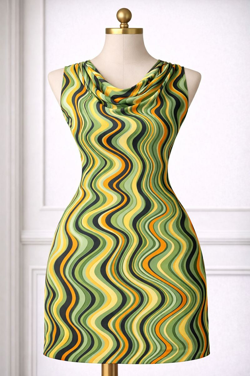 Mannequin wearing a patterned dress with wavy green, yellow, and orange design against a white background.