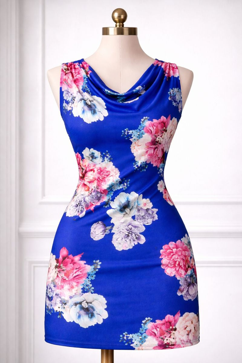 Blue dress with floral pattern on a mannequin against a white background