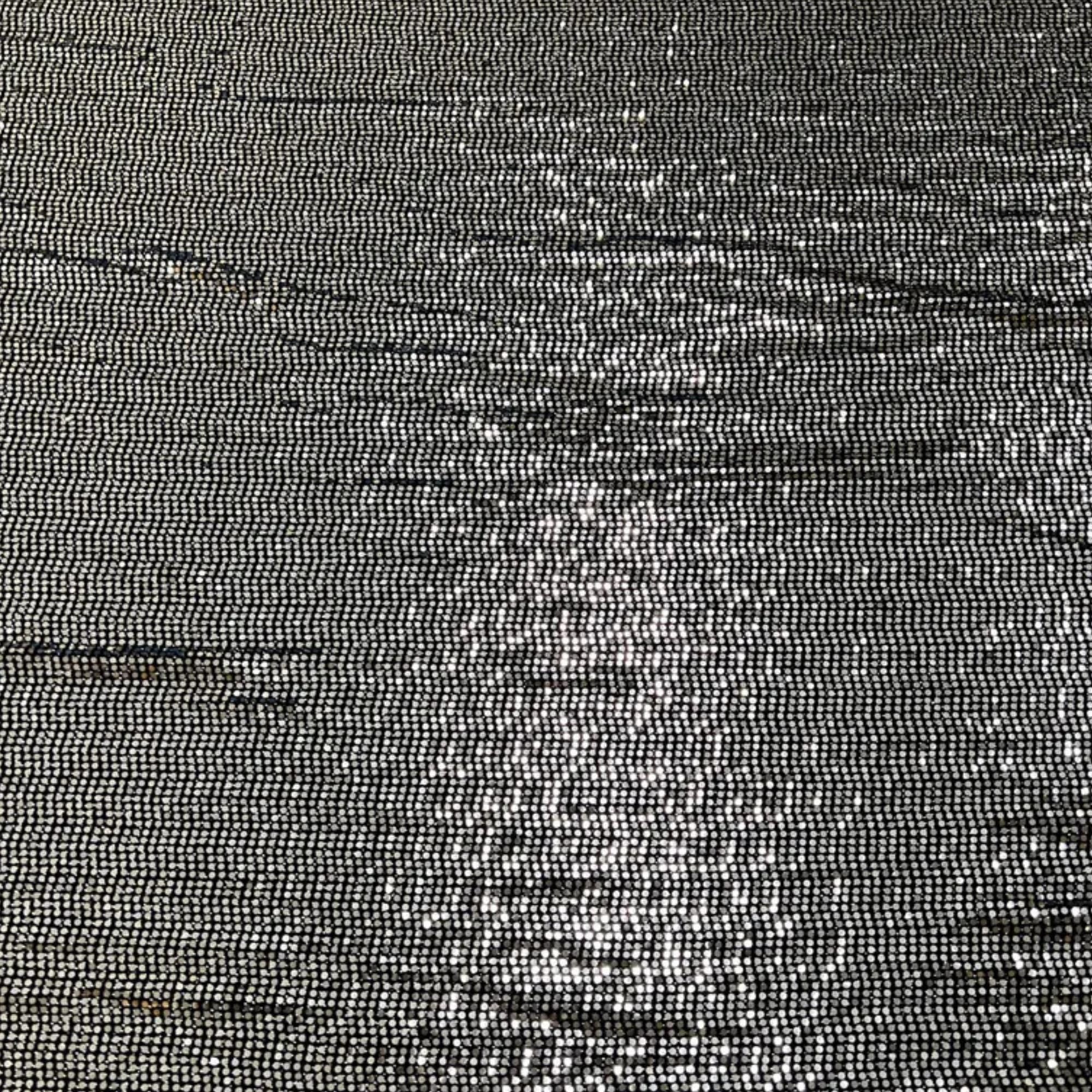 Fabric cut to order, showcasing flexibility and shine
