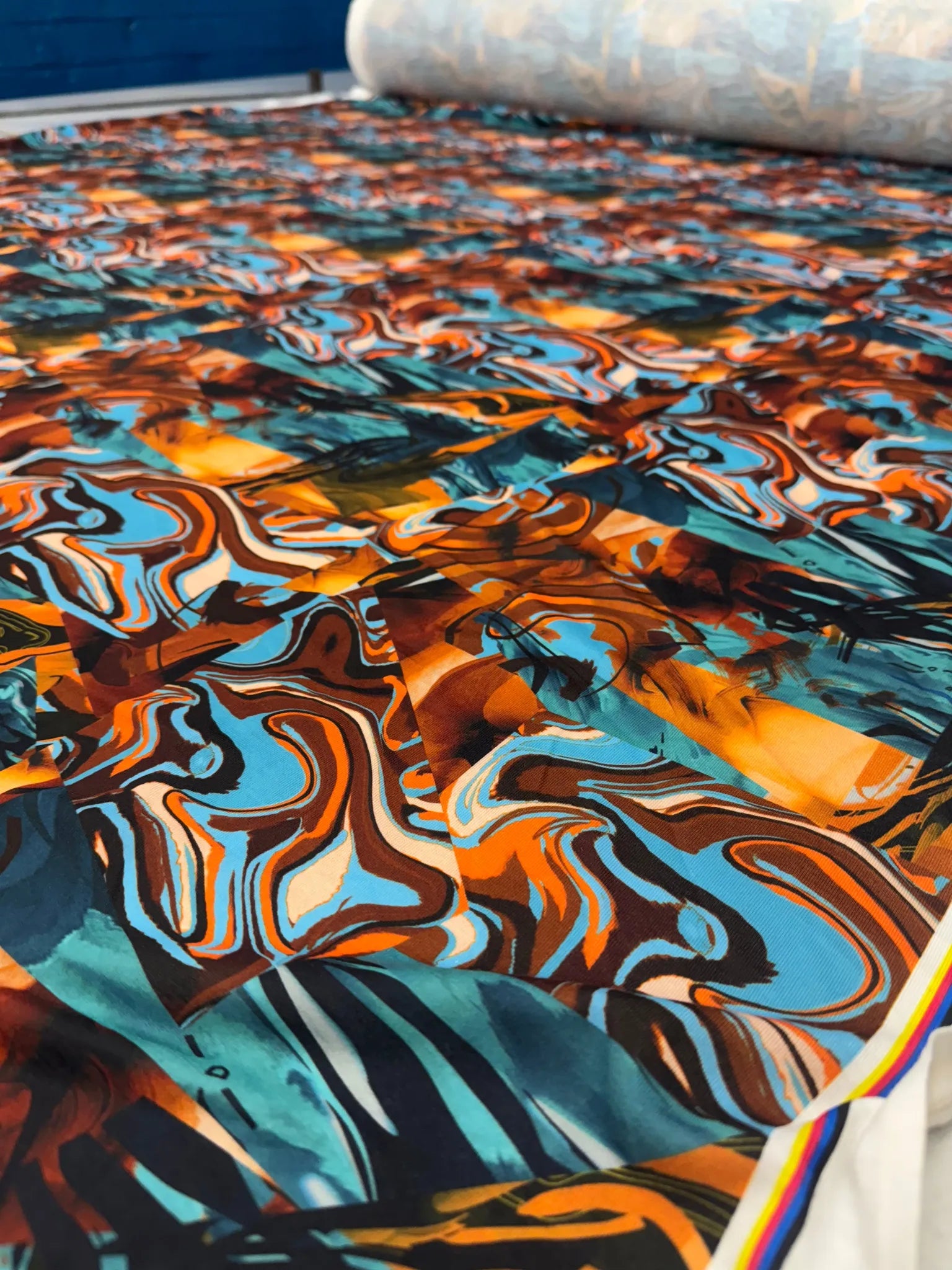 Flowing fabric draped showcasing the abstract design.