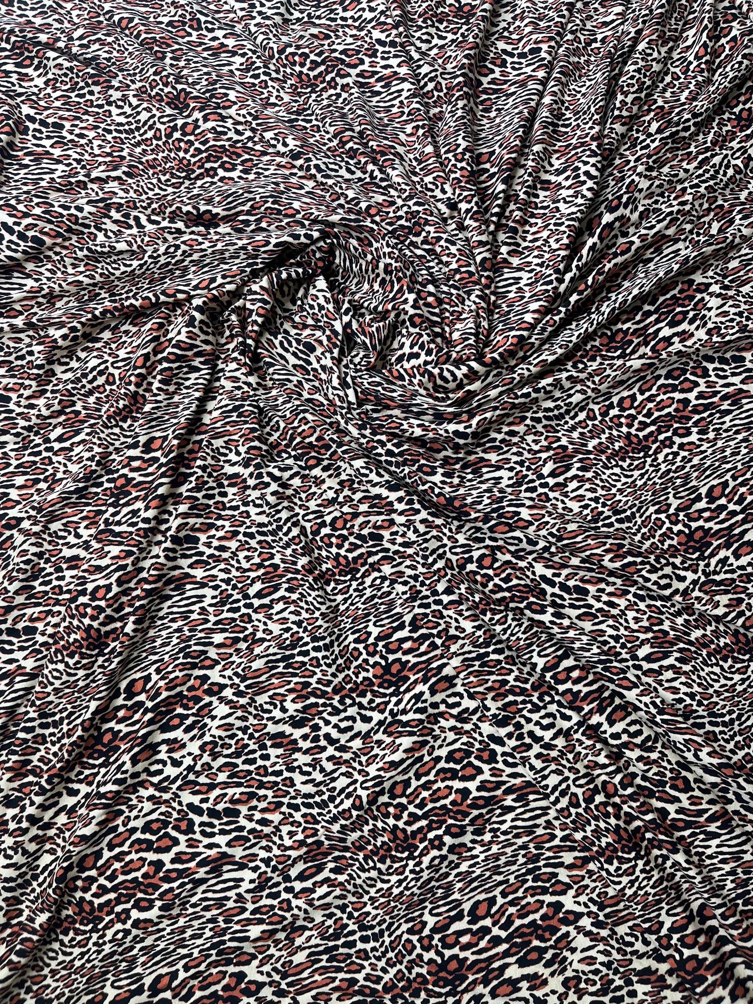 Versatile animal print fabric ideal for dresses and loungewear.