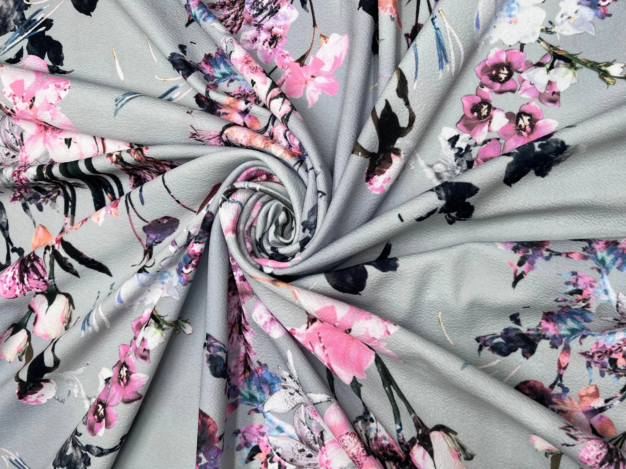 Grey floral fabric ideal for tops and cardigans