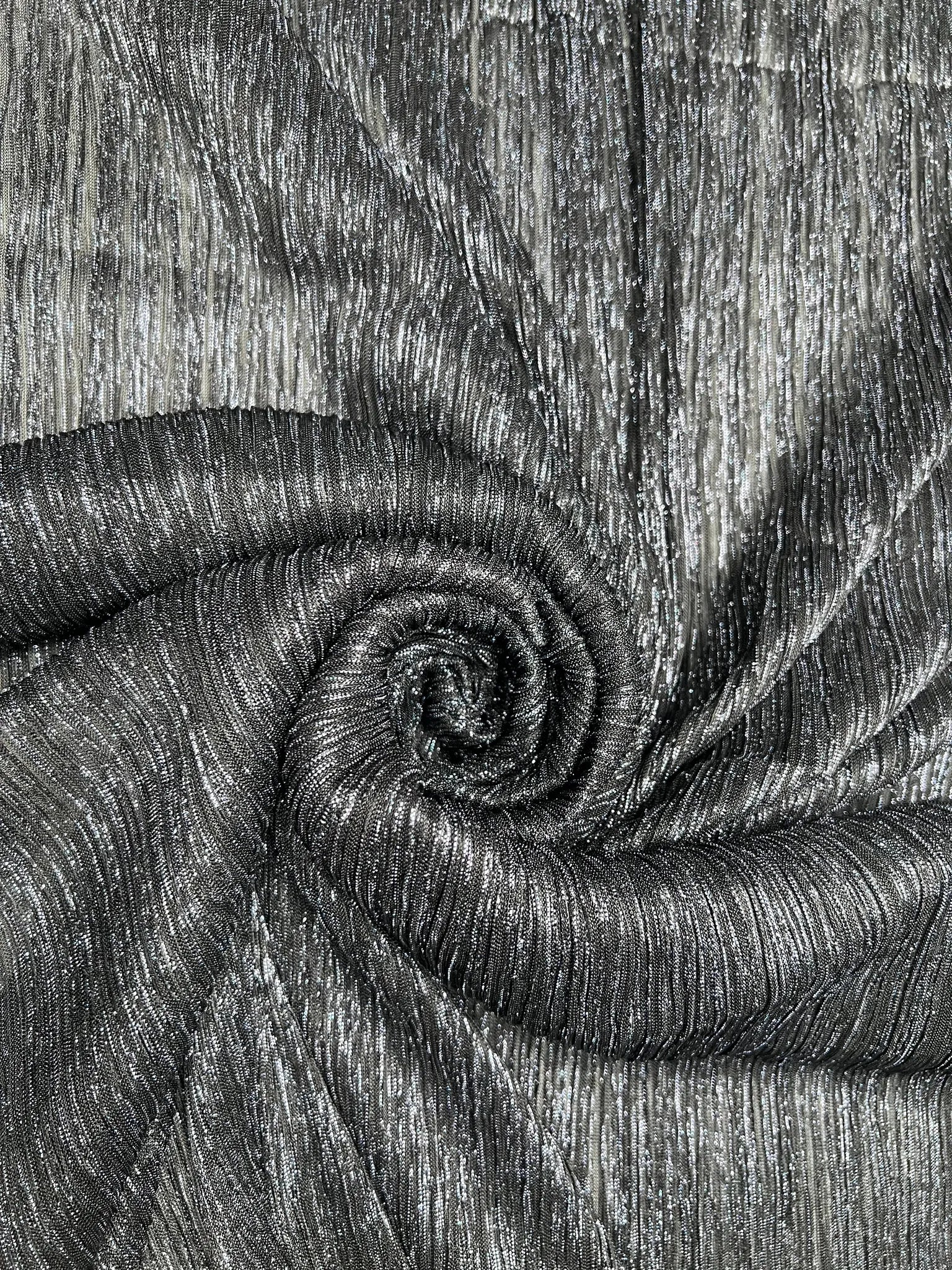 Luxurious black plisse jersey fabric with pleated texture