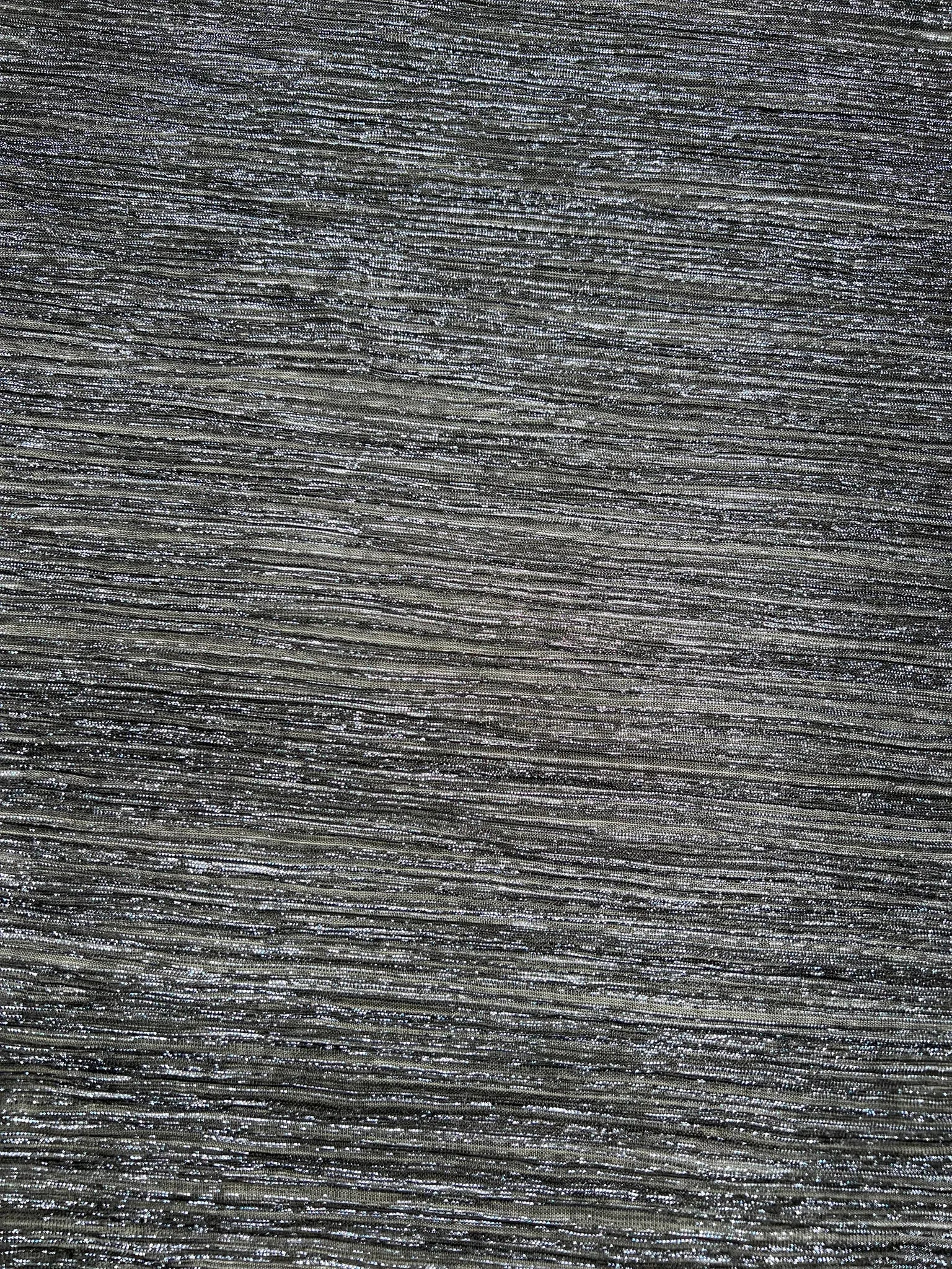 Flowing black plisse fabric perfect for eveningwear