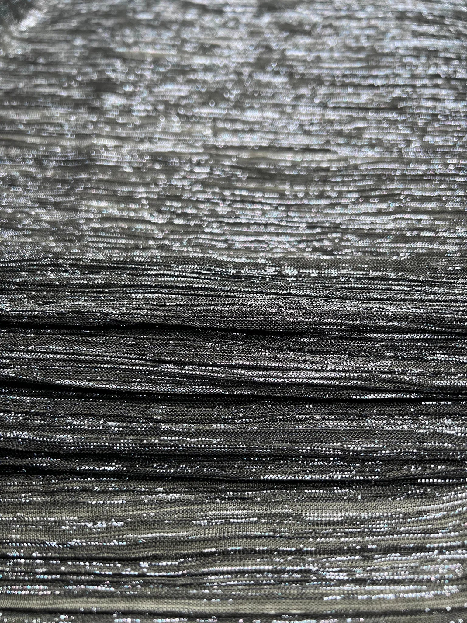 Soft black plisse jersey fabric for sewing stylish tops