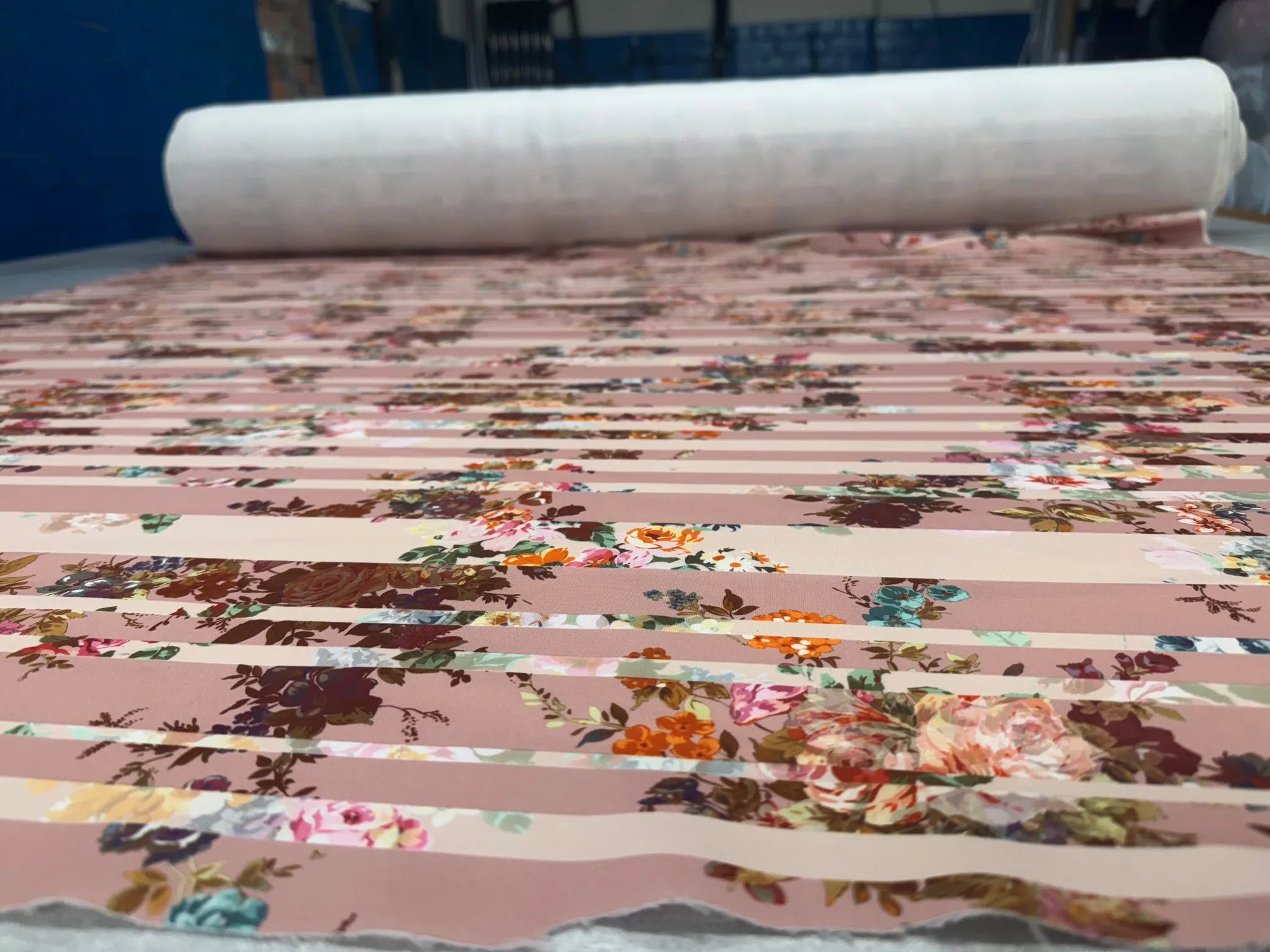 Close-up of floral stripe pattern on scuba fabric