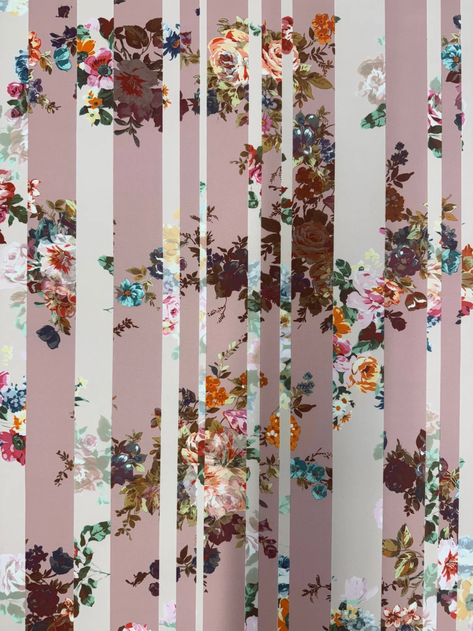 Wide view of dusty pink floral stripe fabric