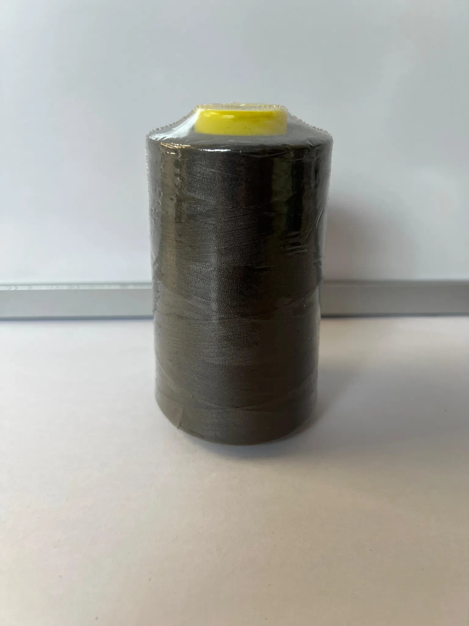 Premium grey spun polyester sewing thread cone, 5000 yards