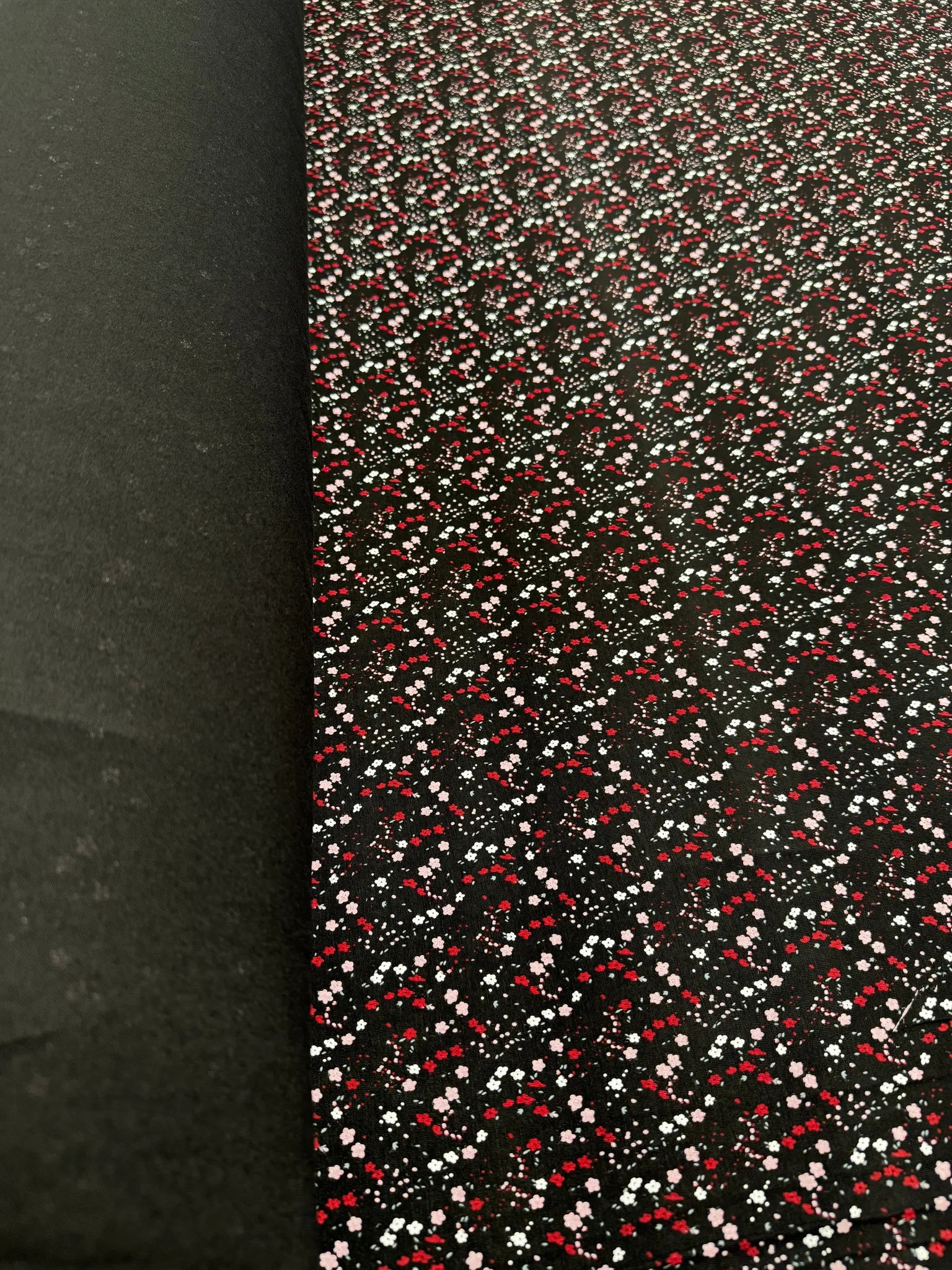 Soft viscose blend fabric with floral print on black