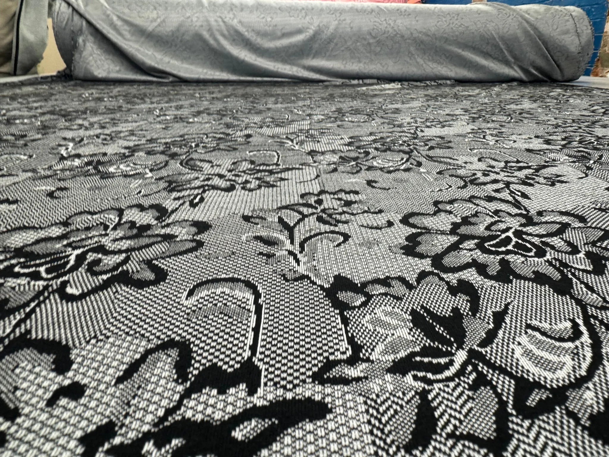 Sewing project featuring black and white lace print jersey
