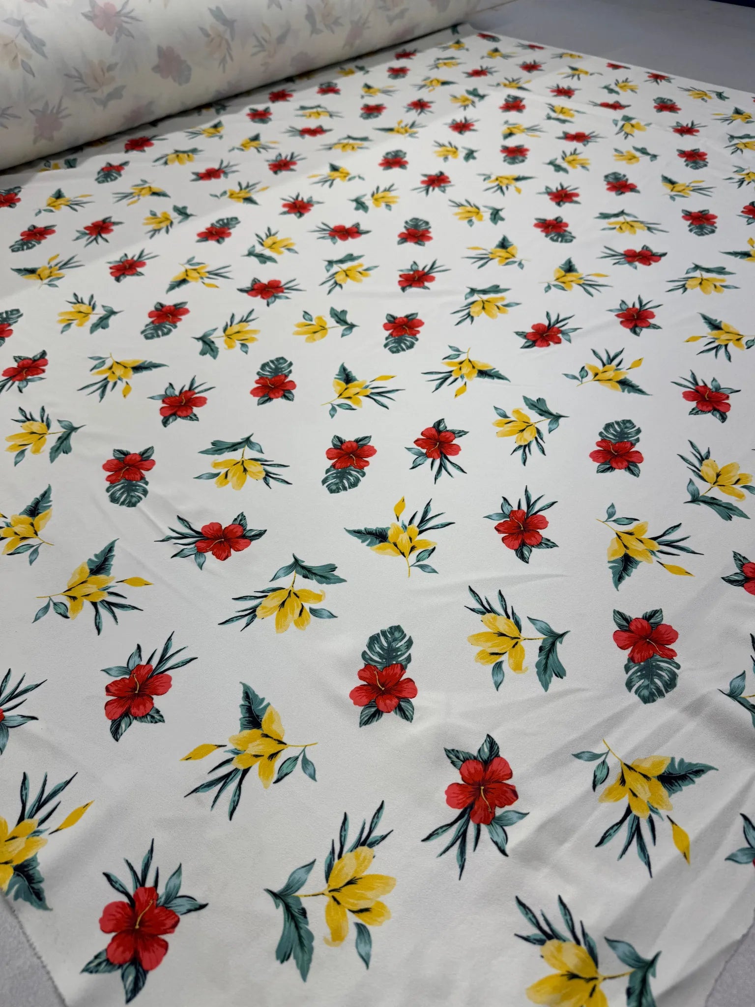 Lightweight woven polyester fabric with tropical floral design