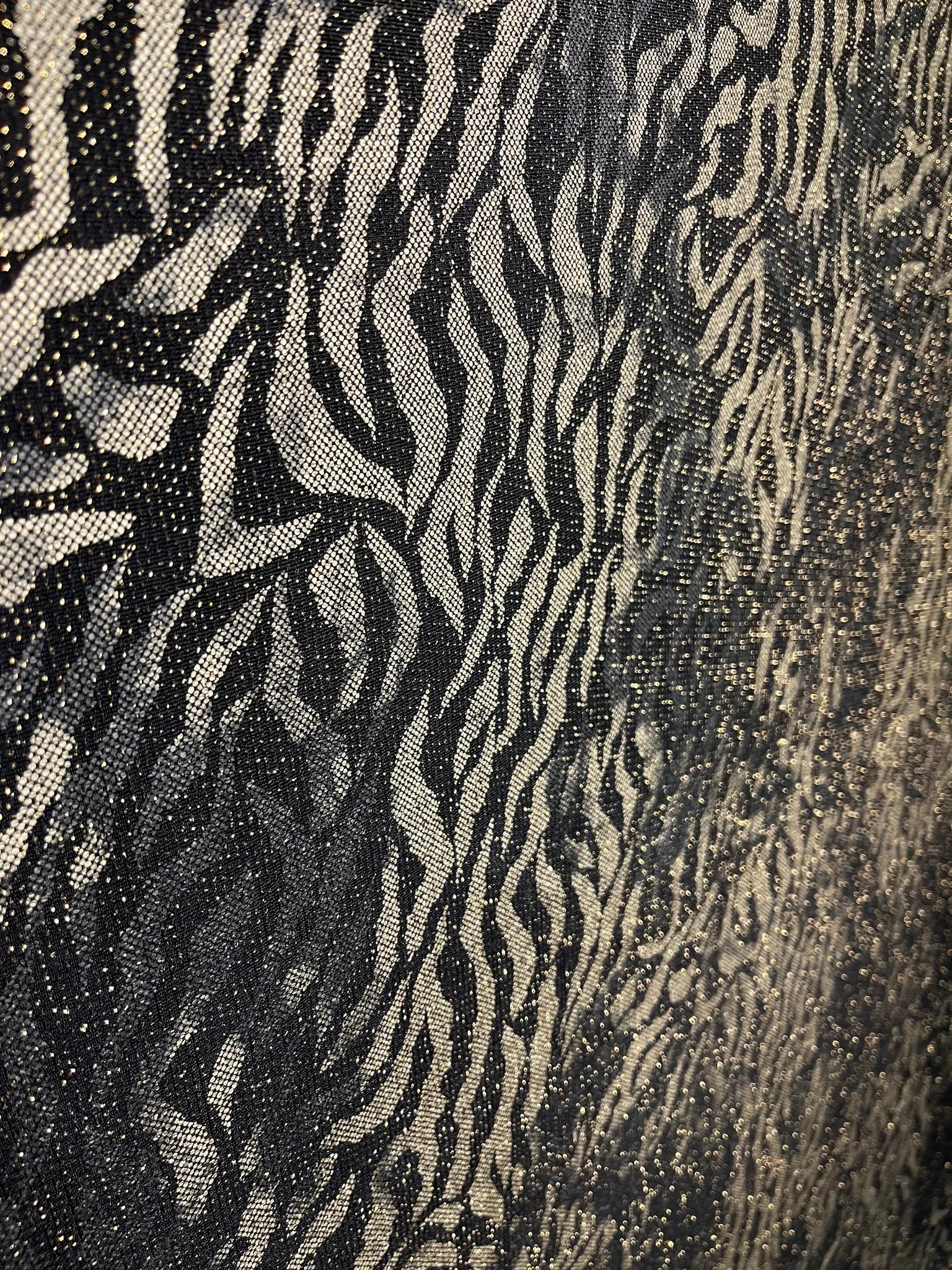 Sewing with black and gold zebra print Lurex fabric