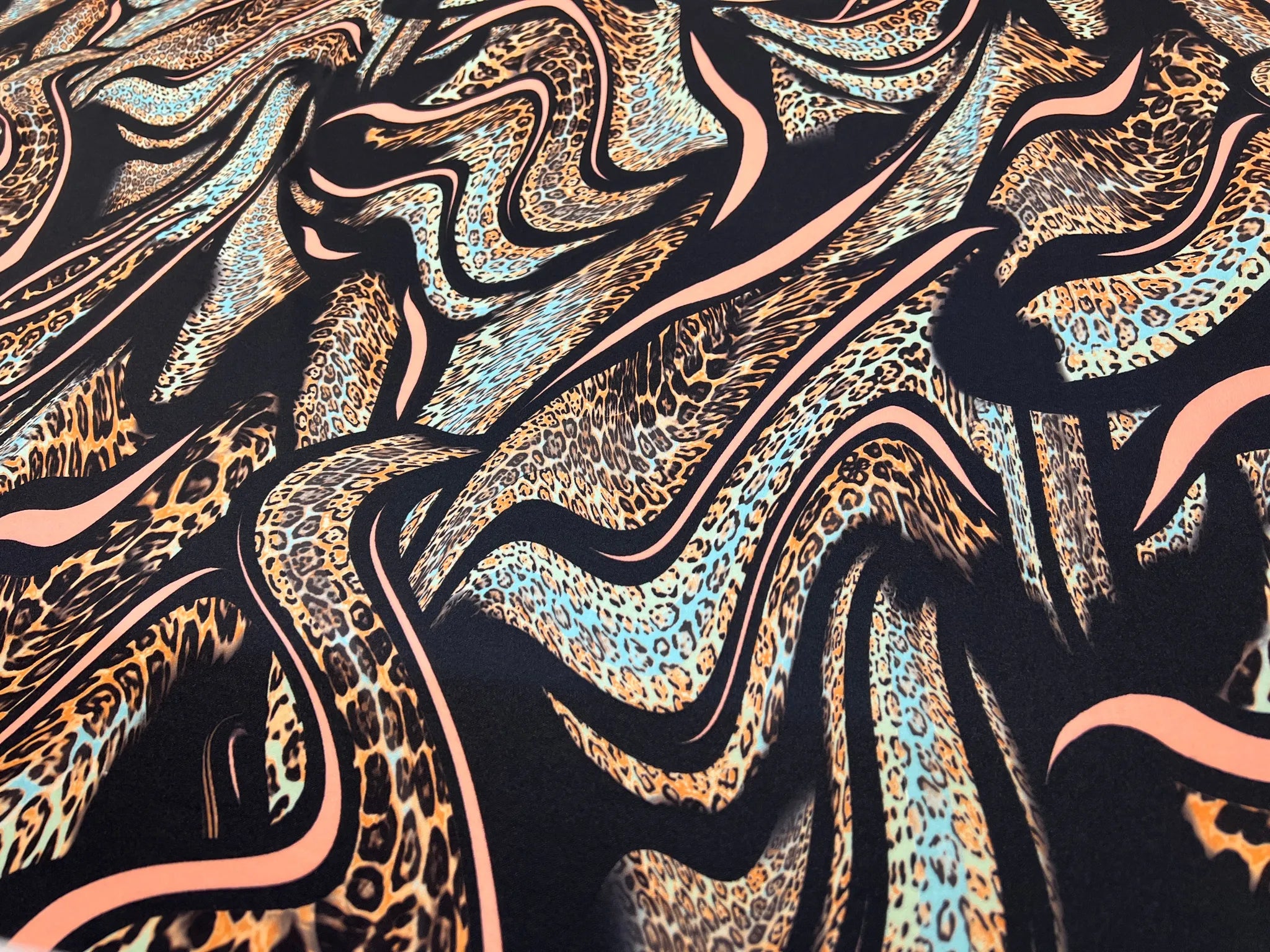 Sewing project made with fluid leopard print scuba fabric