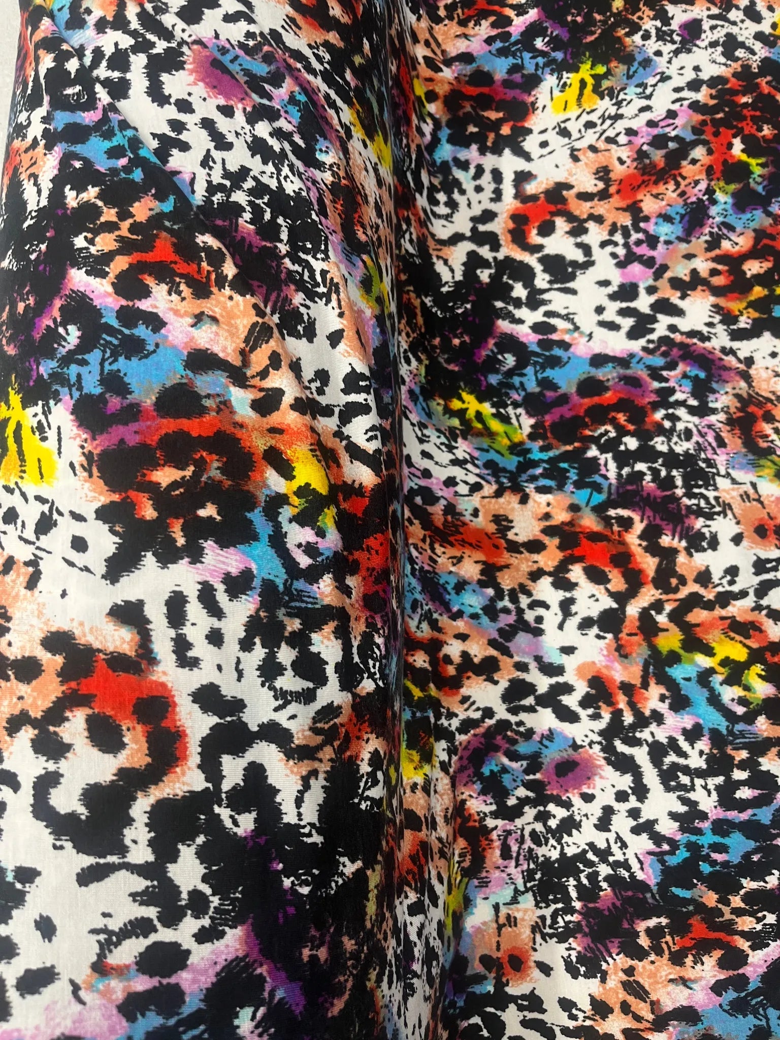 Soft spun polyester jersey fabric with animal print design