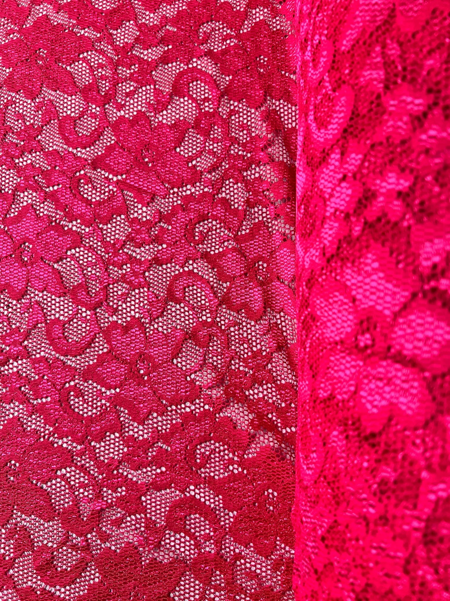 Close-up of the delicate texture of Burgundy Lace Fabric.
