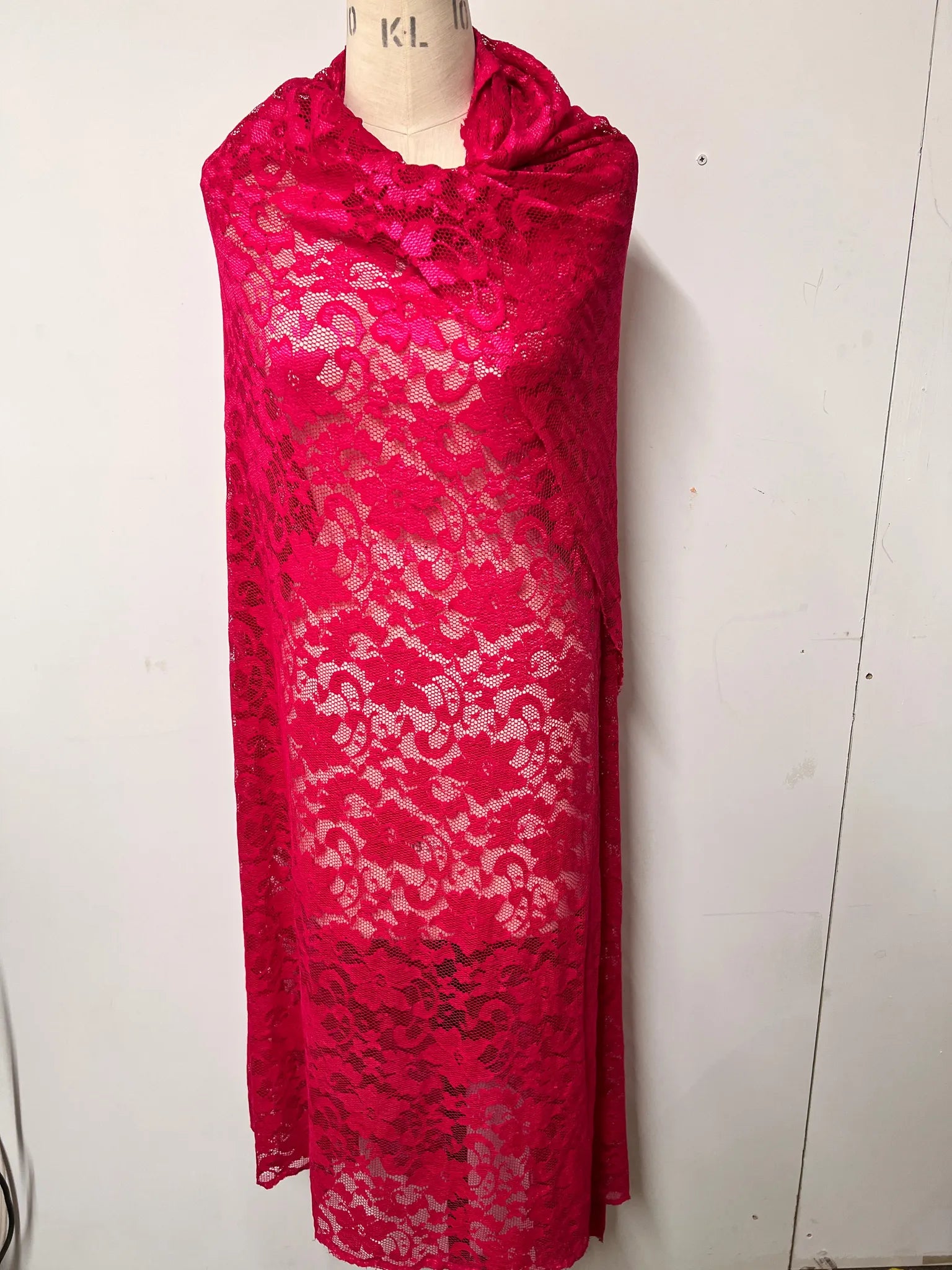 Beautiful floral pattern of Burgundy Lace Fabric.