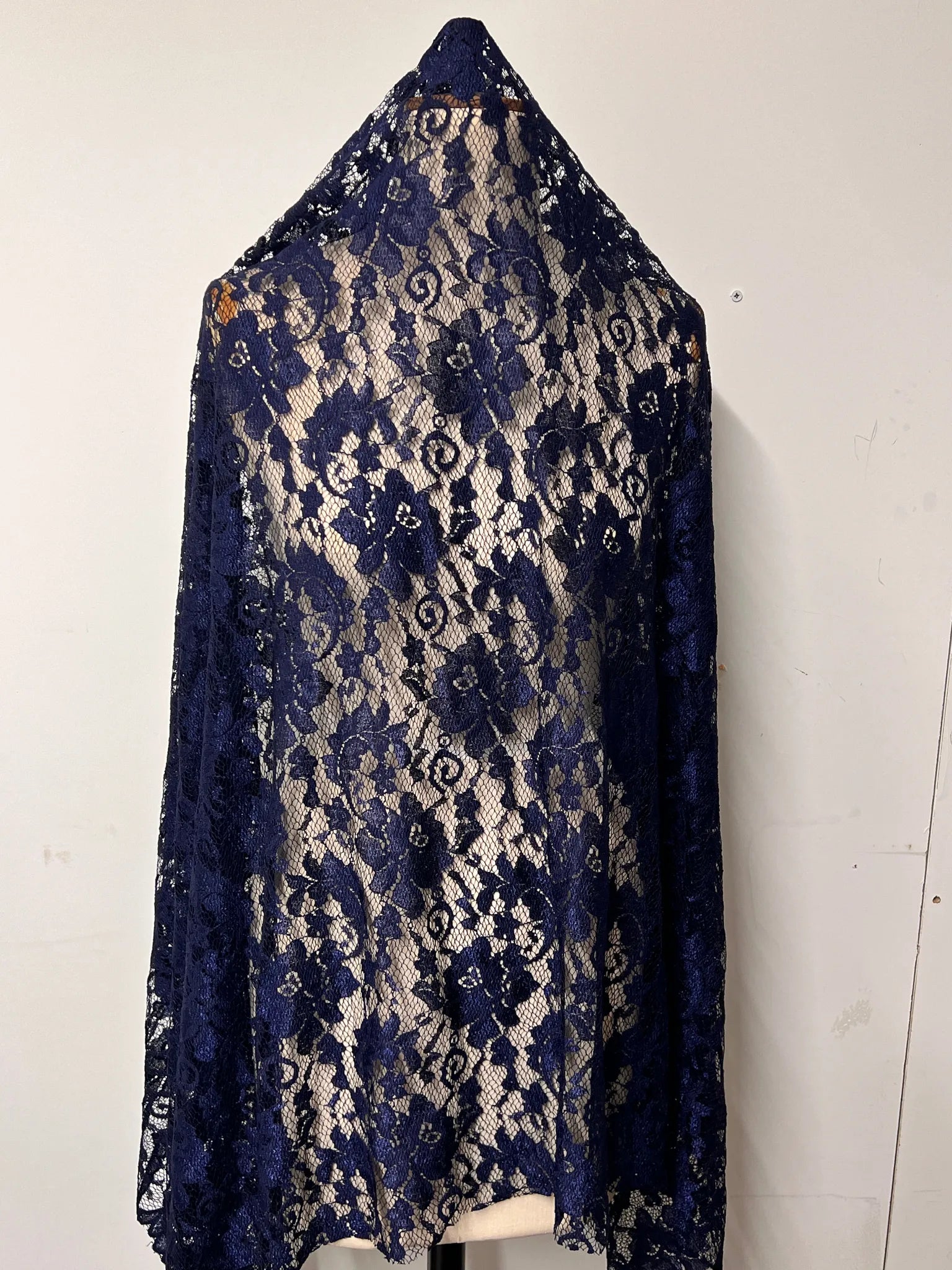 Navy lace fabric ideal for decorative home projects