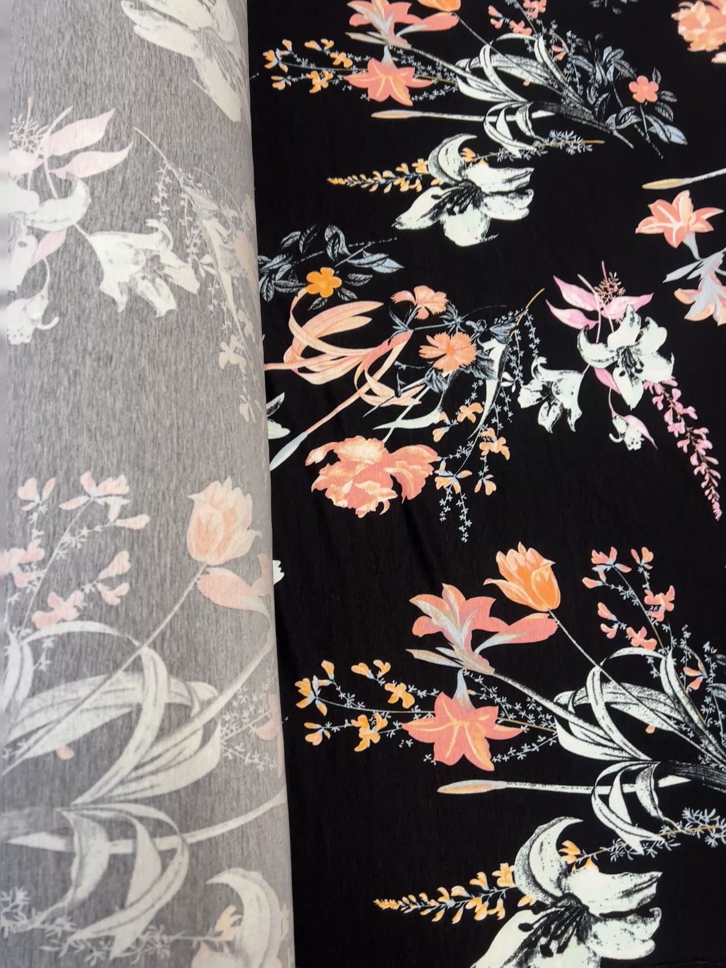 Black Botanical Floral Spun Polyester Jersey Fabric – Peach & Soft Blue Flowers