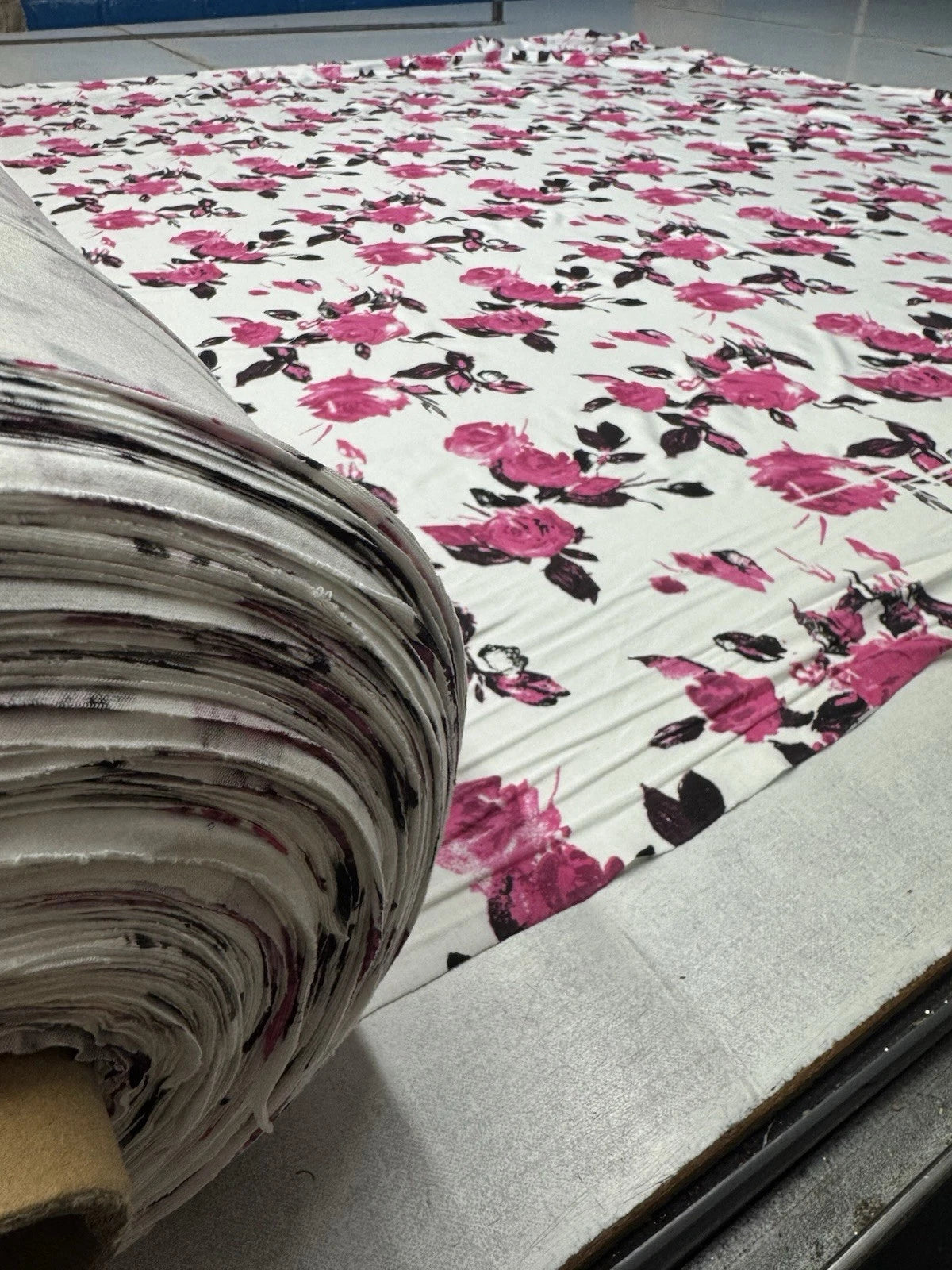 Ivory Floral Spun Polyester Jersey Fabric – Magenta Rose Print 150cm