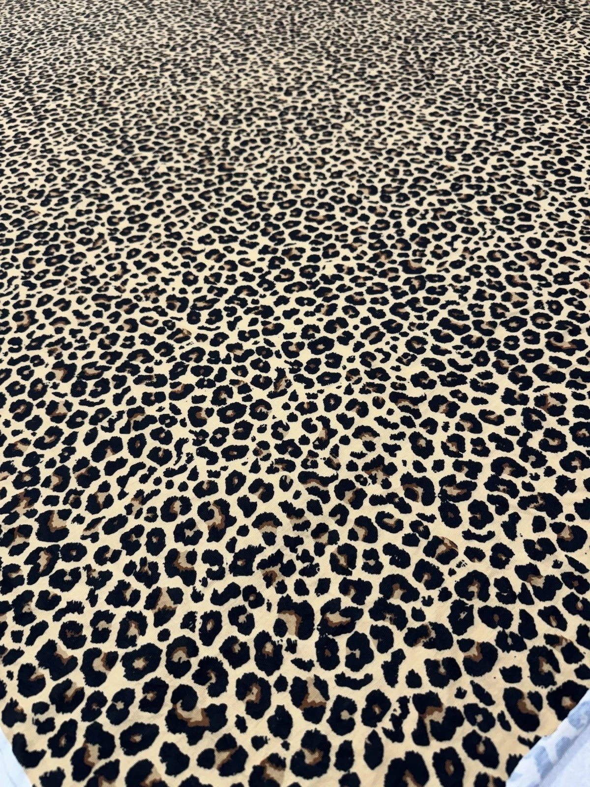 Classic Leopard Print Spun Polyester Jersey Fabric – Cream & Black 153cm