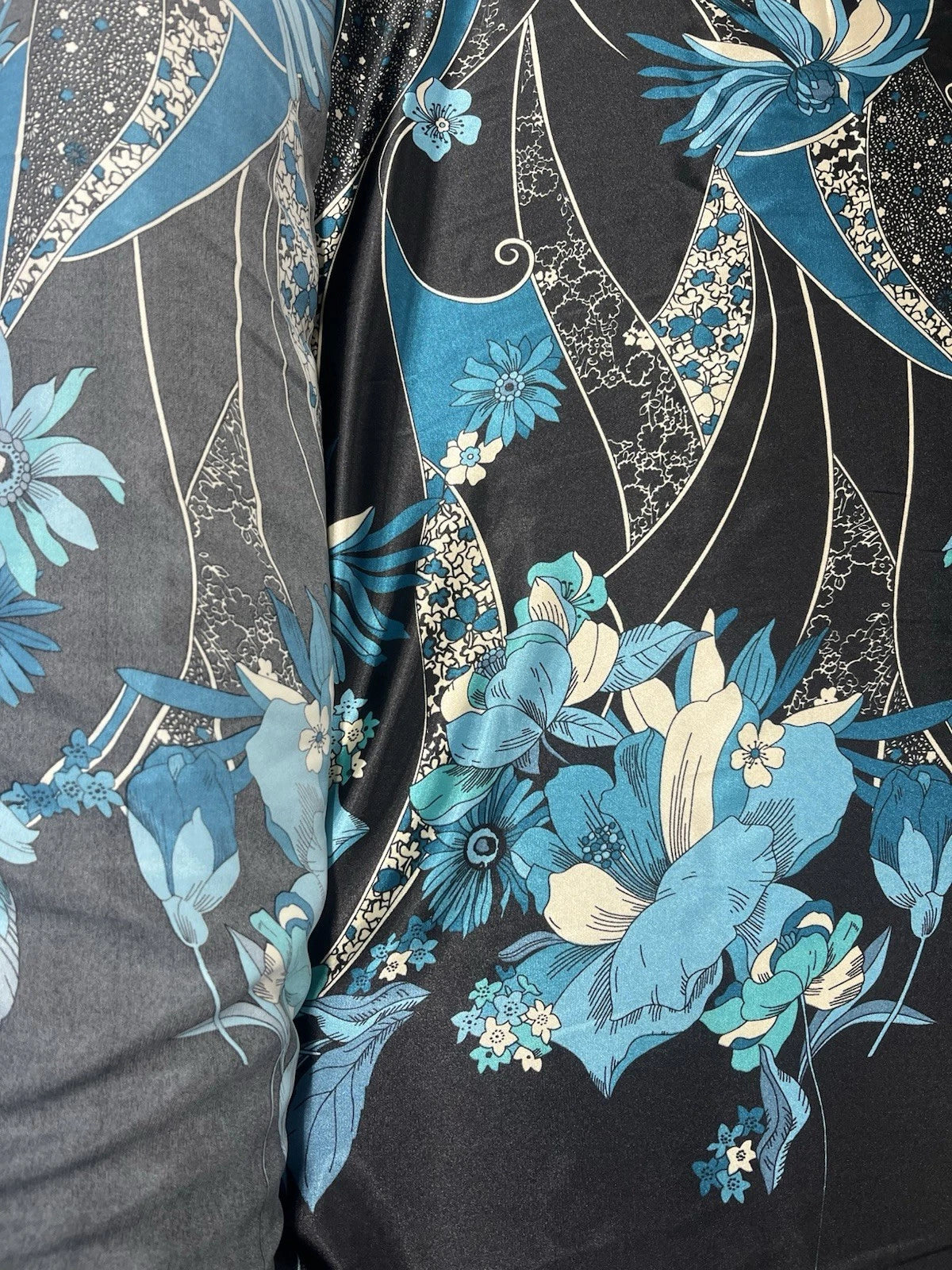 Blue Floral Art Deco Satin Fabric – Black Background 150cm